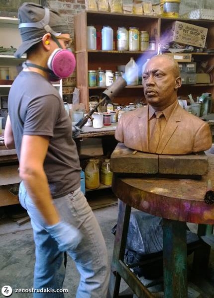 Martin Luther King sculpture at Laran Bronze Foundry. Melanie Serkes develops the patina of the Frudakis sculpture. 