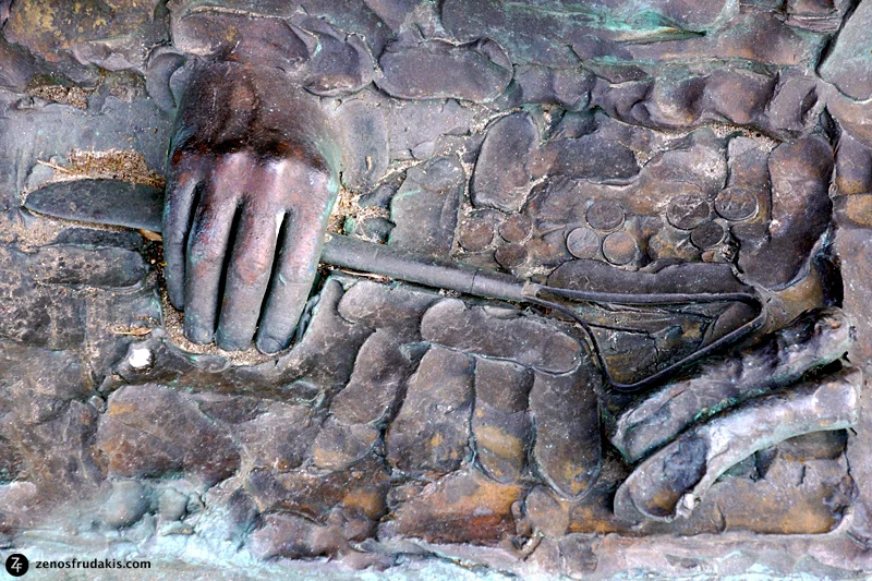 Sculpture by Duane Hanson of Zenos' hands is integrated into the Freedom sculpture.