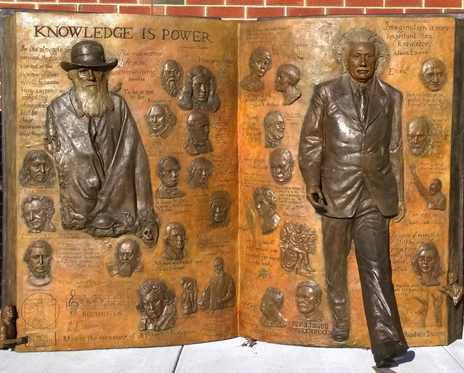 Knowledge is Power, relief sculpture