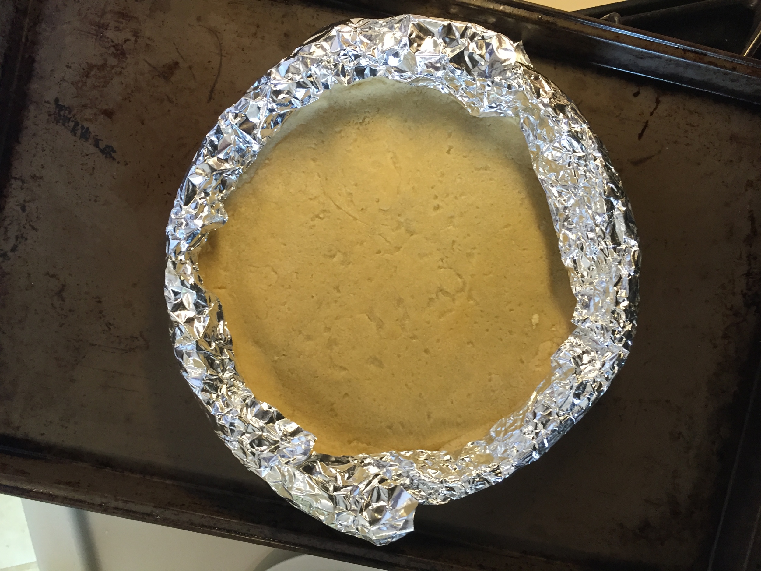 Cover the edges with foil if they brown faster than the rest of the shell.