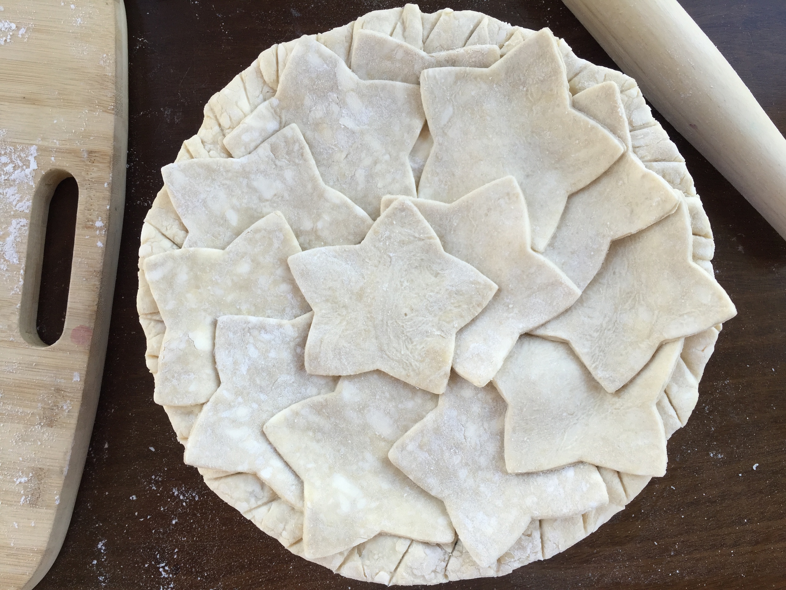 Once the outer edge is covered, add more stars to cover the center of the pie.