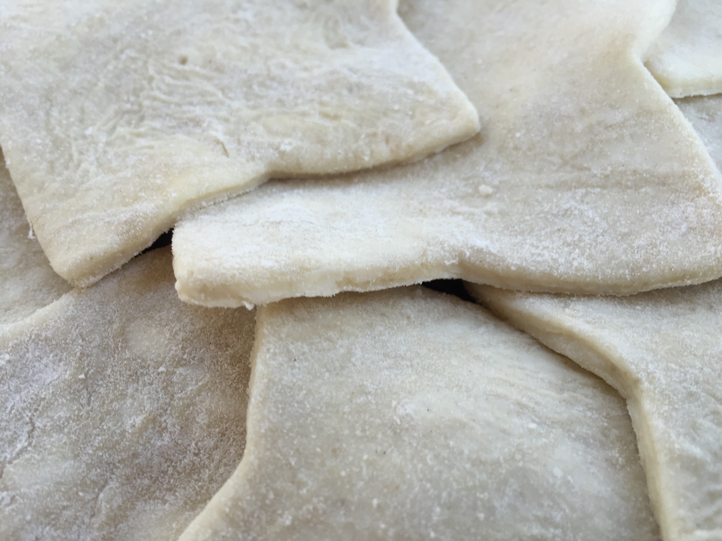 Toward the center, leave gaps to act as steam vents during cooking. Remember that the stars will shrink back as they cook, which will cause the gaps to expand.