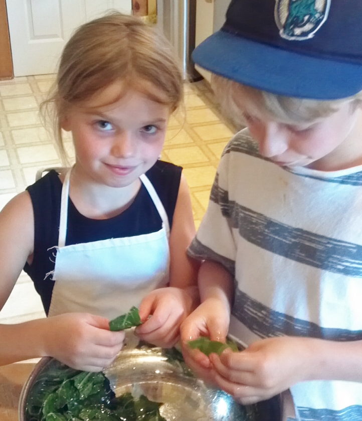 My kids helping to make kale chips a couple years ago.