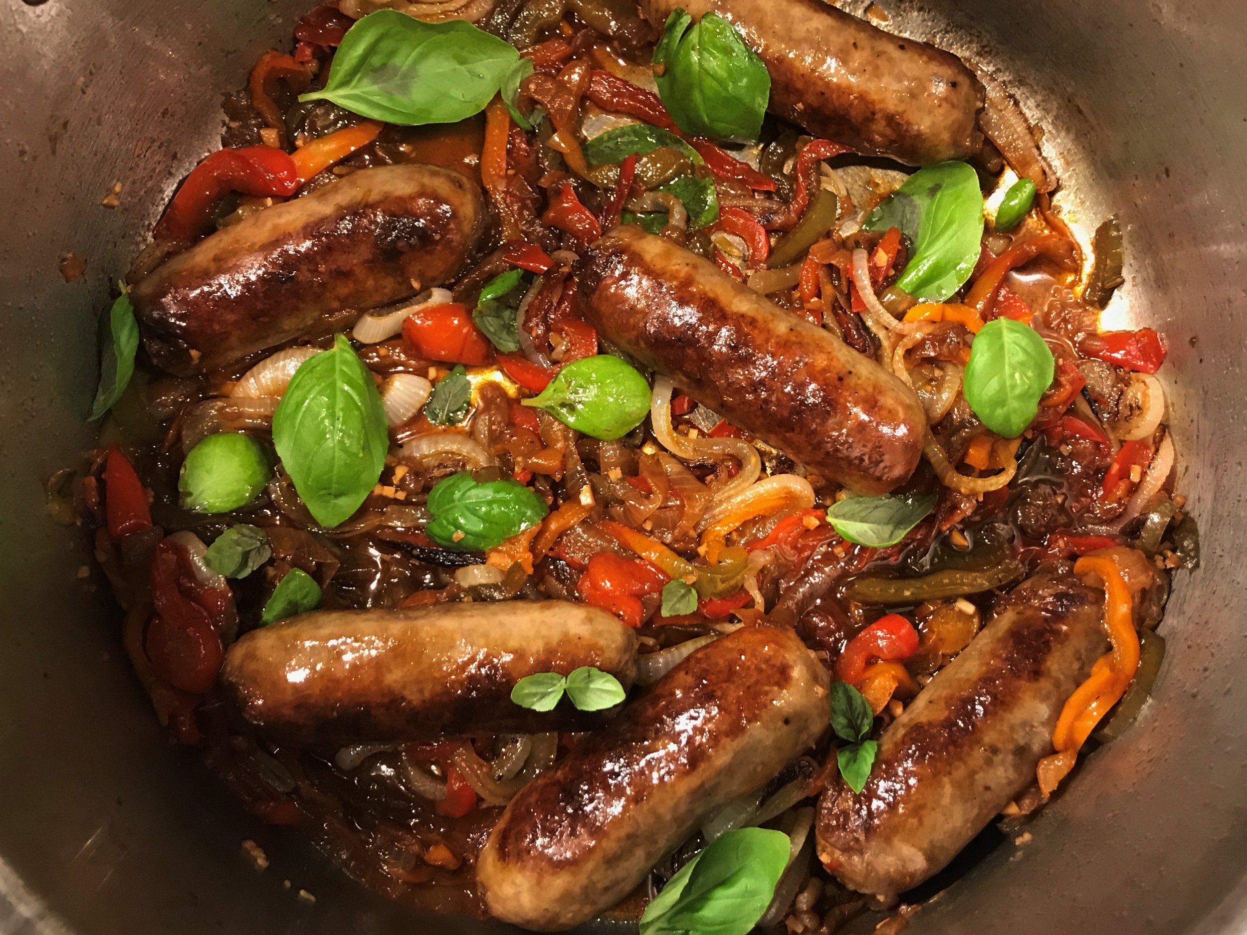 https://images.squarespace-cdn.com/content/v1/53f66561e4b07ba743a341fe/1507326612126-SNOECBXG9RADOBNXYCOV/Easy+Sausages+with+Peppers+and+Onions.jpg