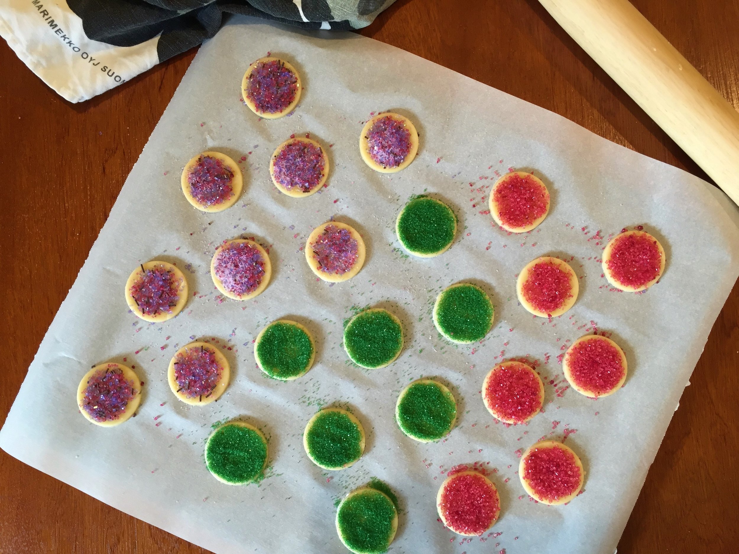 Simplest Cookie-Cutter Cookies topped with colored sugar, ready to go into the Adventure Kitchen oven.
