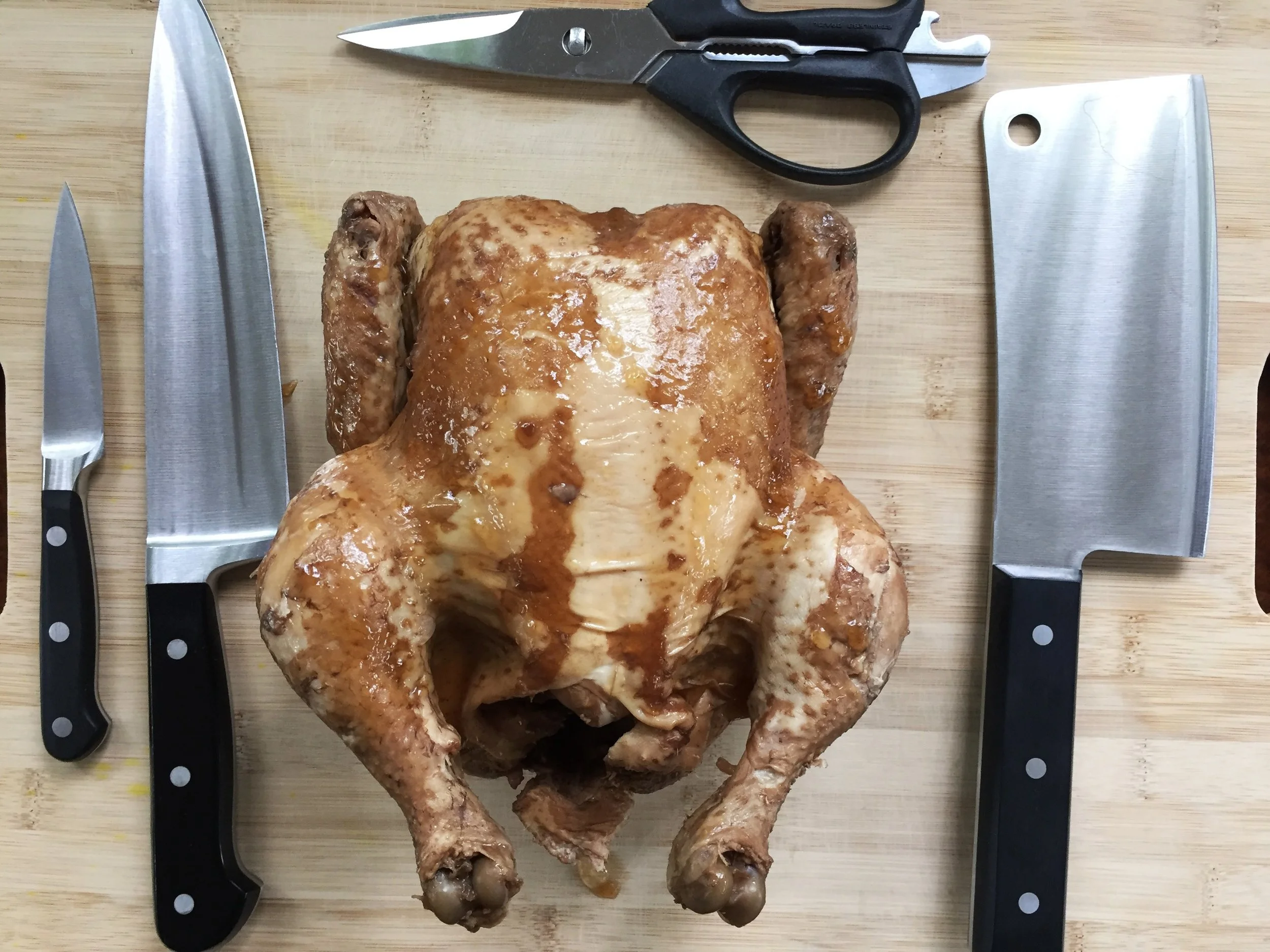 Notice the stripey color of our chicken! It seems this is par for the course, but you can help minimize it by stirring the cooking liquid and shifting the position of the chicken periodically as it rests overnight. When it's time to serve, strategic use of cilantro garnish can help camouflage any unevenness.