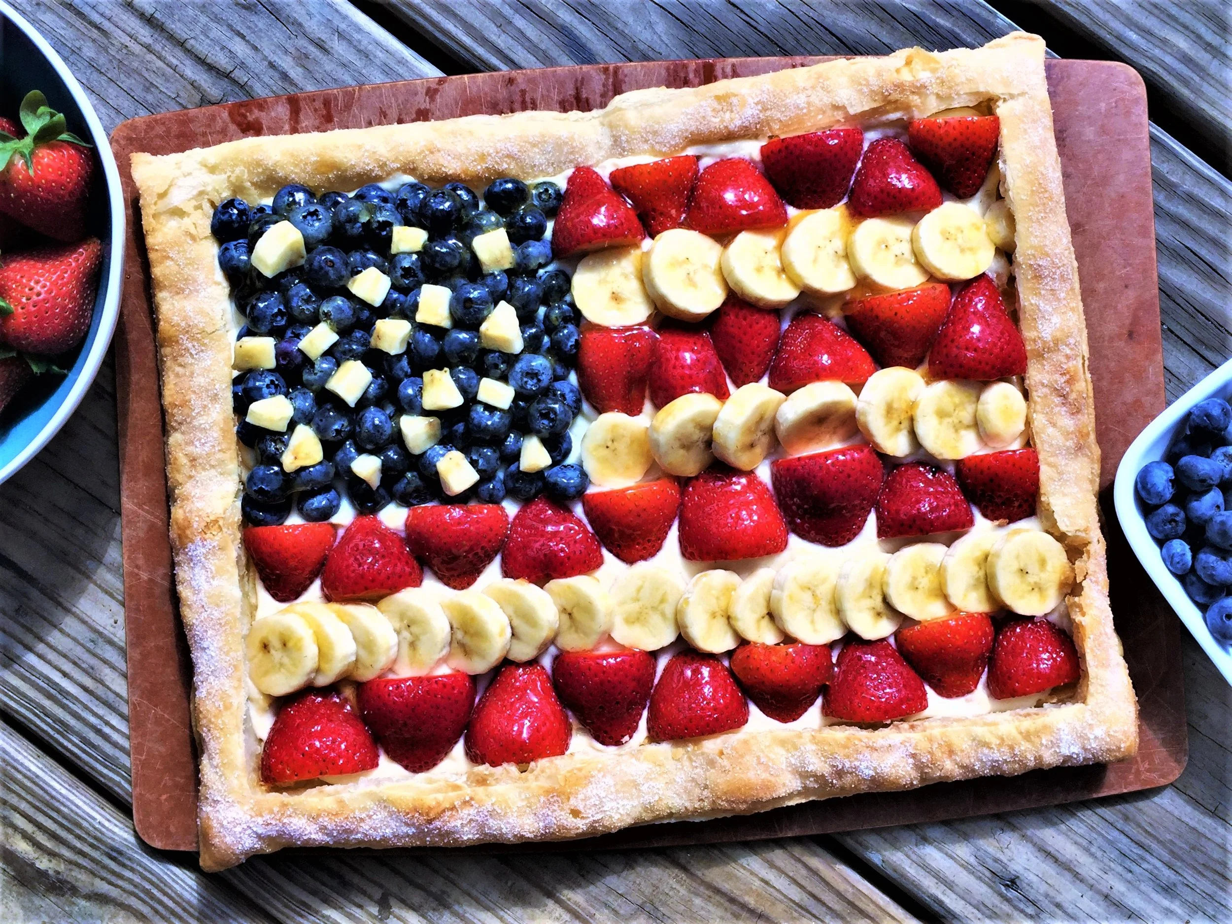 https://images.squarespace-cdn.com/content/v1/53f66561e4b07ba743a341fe/1520030736788-13908MYXXLXN0EZRD3RP/American%2BFlag%2BPuff%2BPastry%2BTart%2B-%2Bprimary.jpg