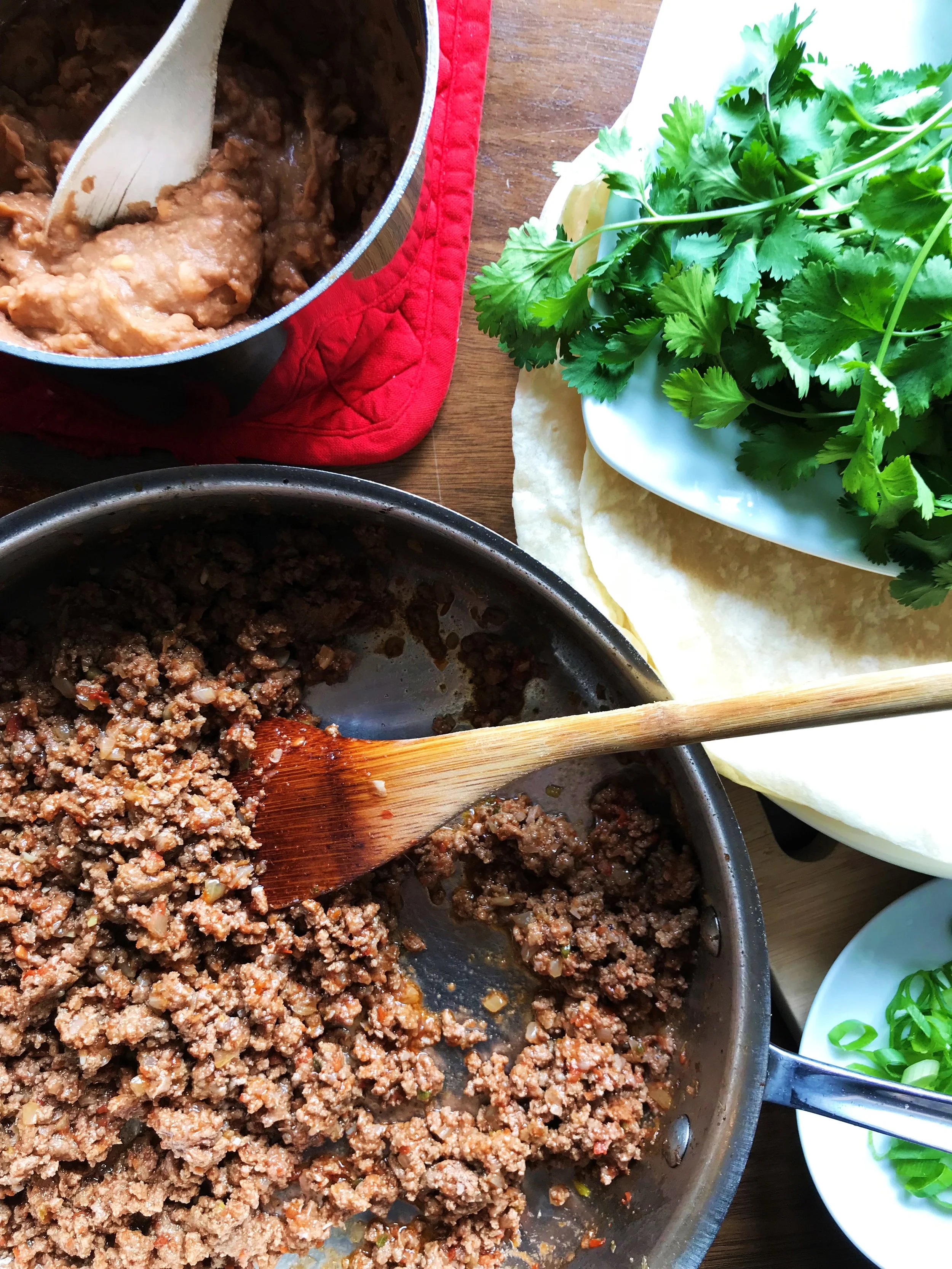 Ground beef, refried beans and other ingredients for Lunchbox Beef & Bean Burritos. Oh yeah.