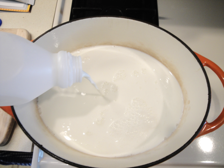 Pouring in the goat's milk