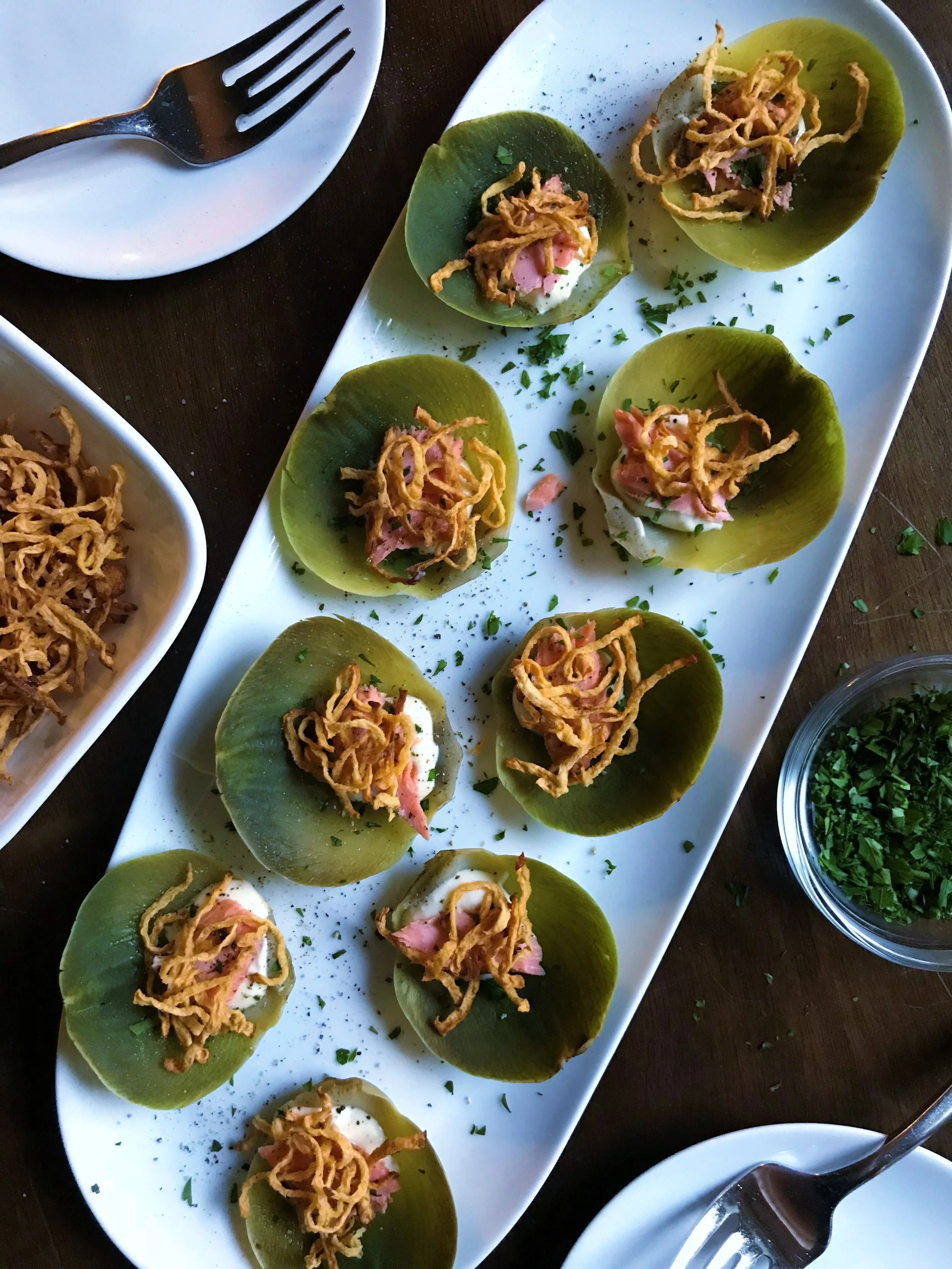 The outer leaves of an artichoke are the perfect appetizer-delivery device, cooked until tender then topped with salmon, garlic-mascarpone and crispy fried rutabaga straws. Perfect way to use leftover salmon in something nice. And the rutabaga straws are my new favorite thing.