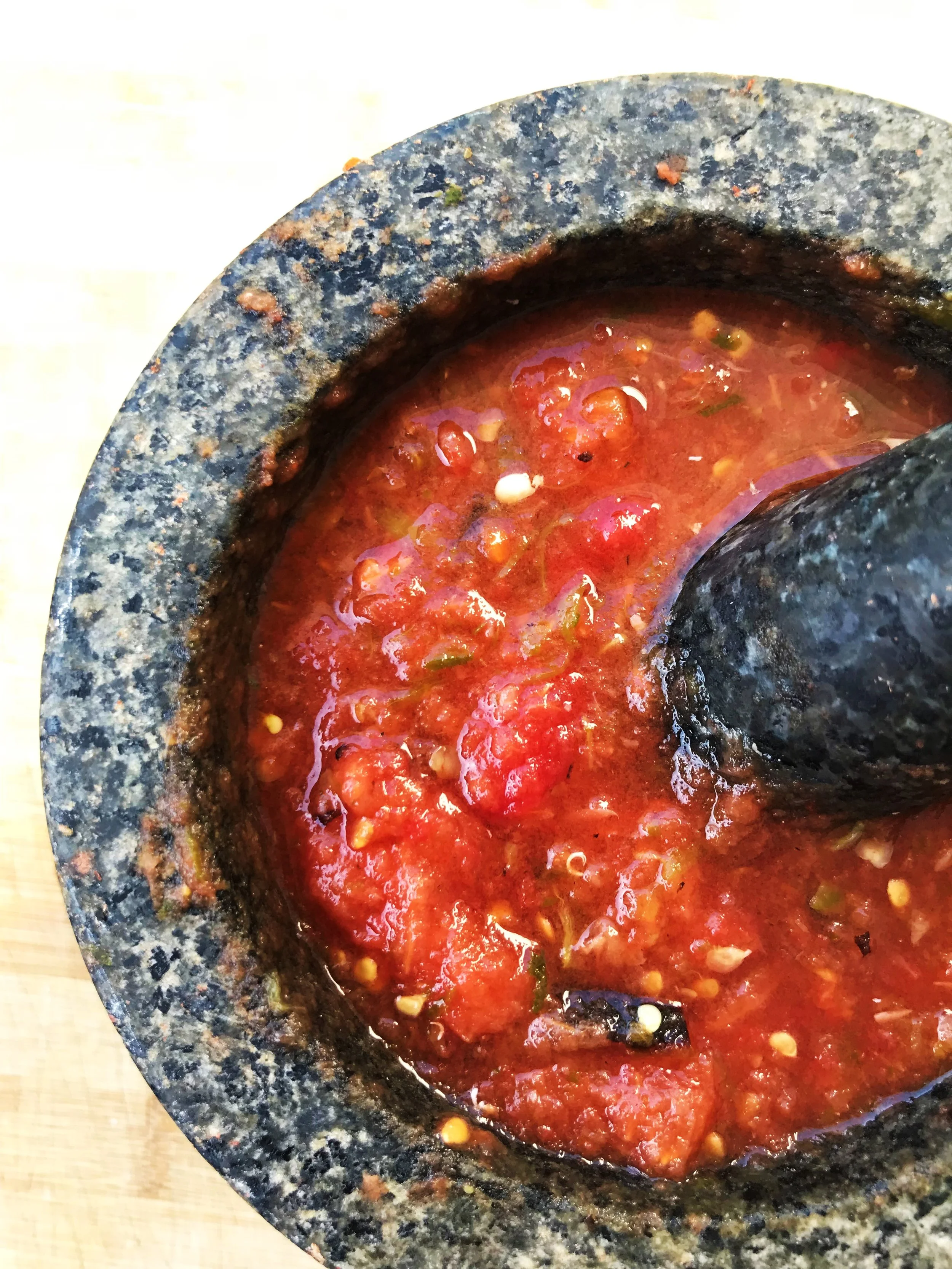 Salsa de Molcajete made in the Adventure Kitchen. Broiled tomatoes and toasted serranos with fresh garlic and a little salt. Very simple and really great.
