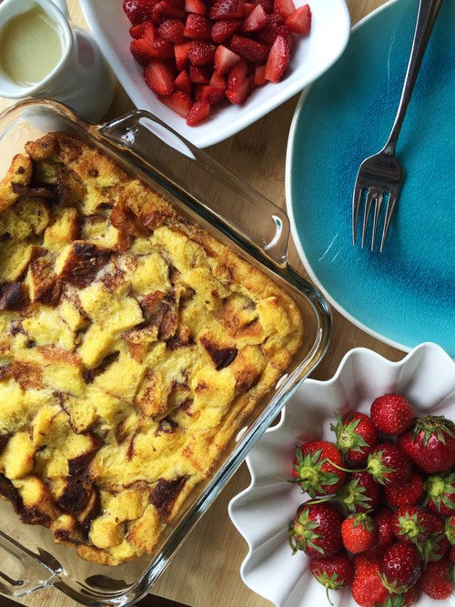 Cinnamon Brioche Bread Pudding made in the Adventure Kitchen with cinnamon brioche from my local bakery. Delicious with fresh strawberries (or any summer fruit!), and Grand Marnier cream sauce .