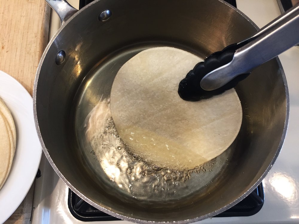 After 5-15 seconds, small bubbles may begin to emerge in the surface of the tortilla as it cooks. 