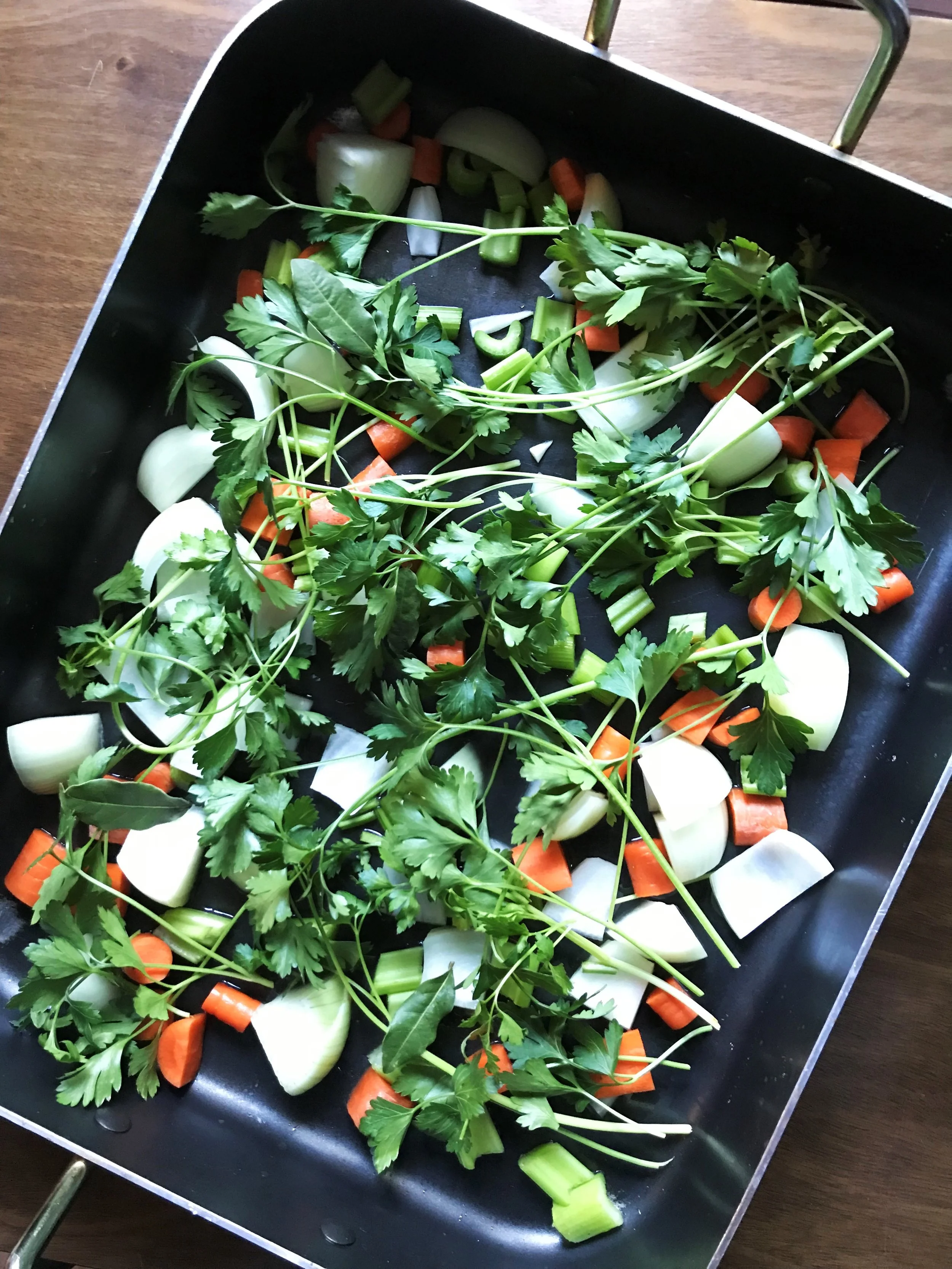 My roasting pan with aromatics, ready for the turkey.