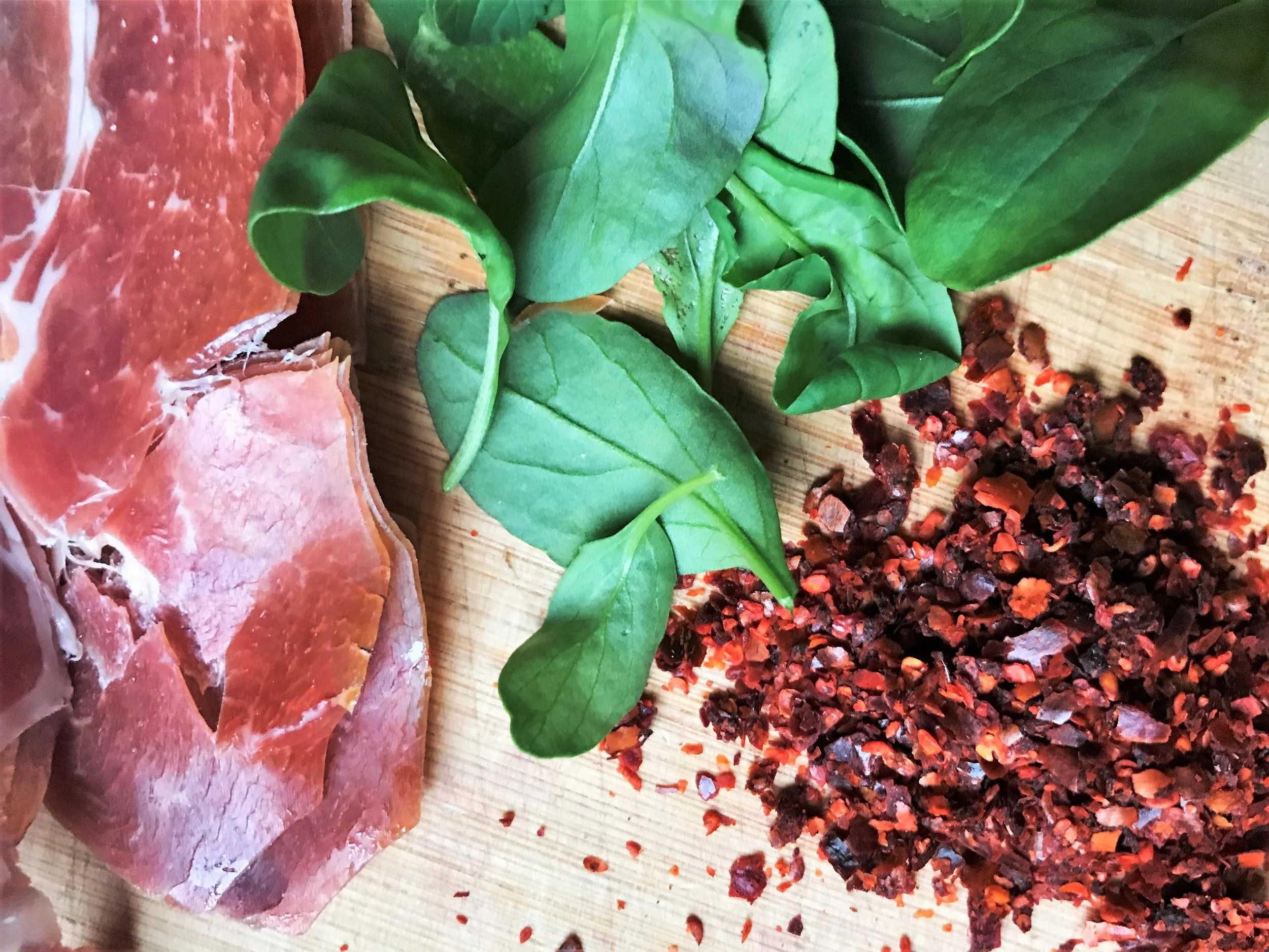 arugula + prosciutto = a green new deal of a pizza