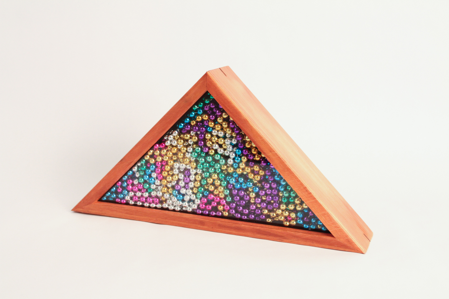 Triangle Box , 2017. Plastic, wood. 8.75” x 17” x 3.25”