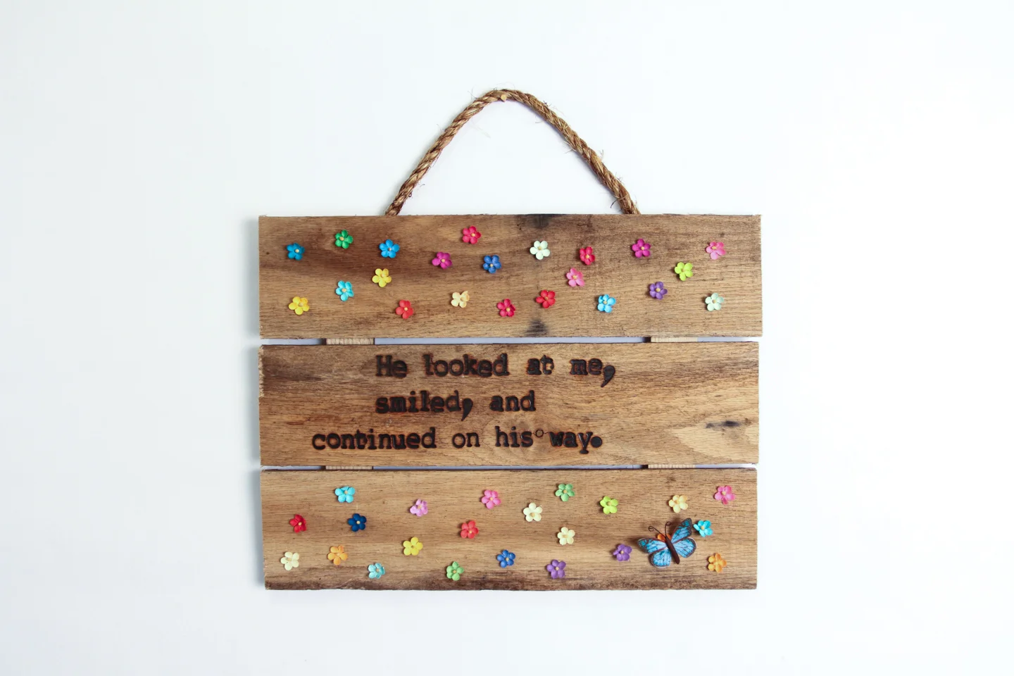 Confessional Board (smiled) , 2017. Paper, rope, wood. 15.25” x 15.5” x 1.5”.