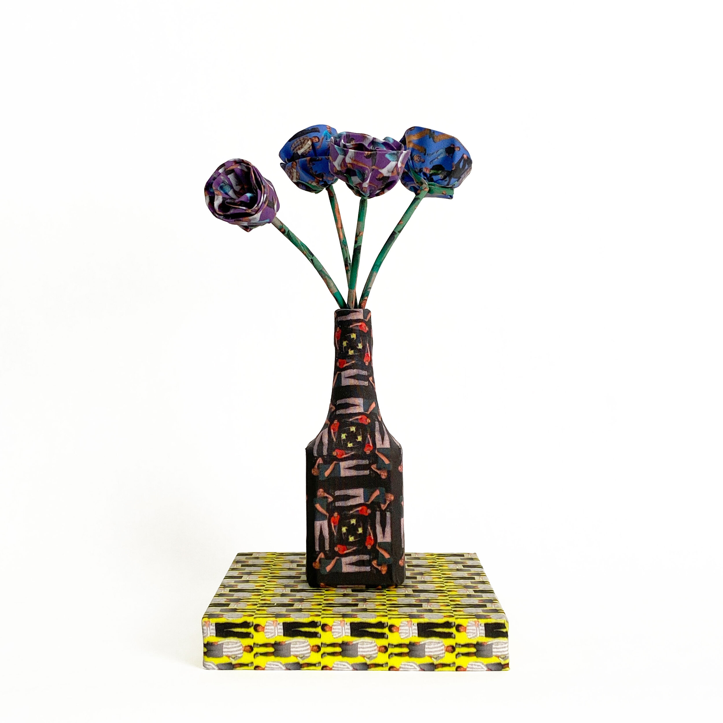 Blue-and-Purple-Flowers-in-a-Black-Vase-1.jpg