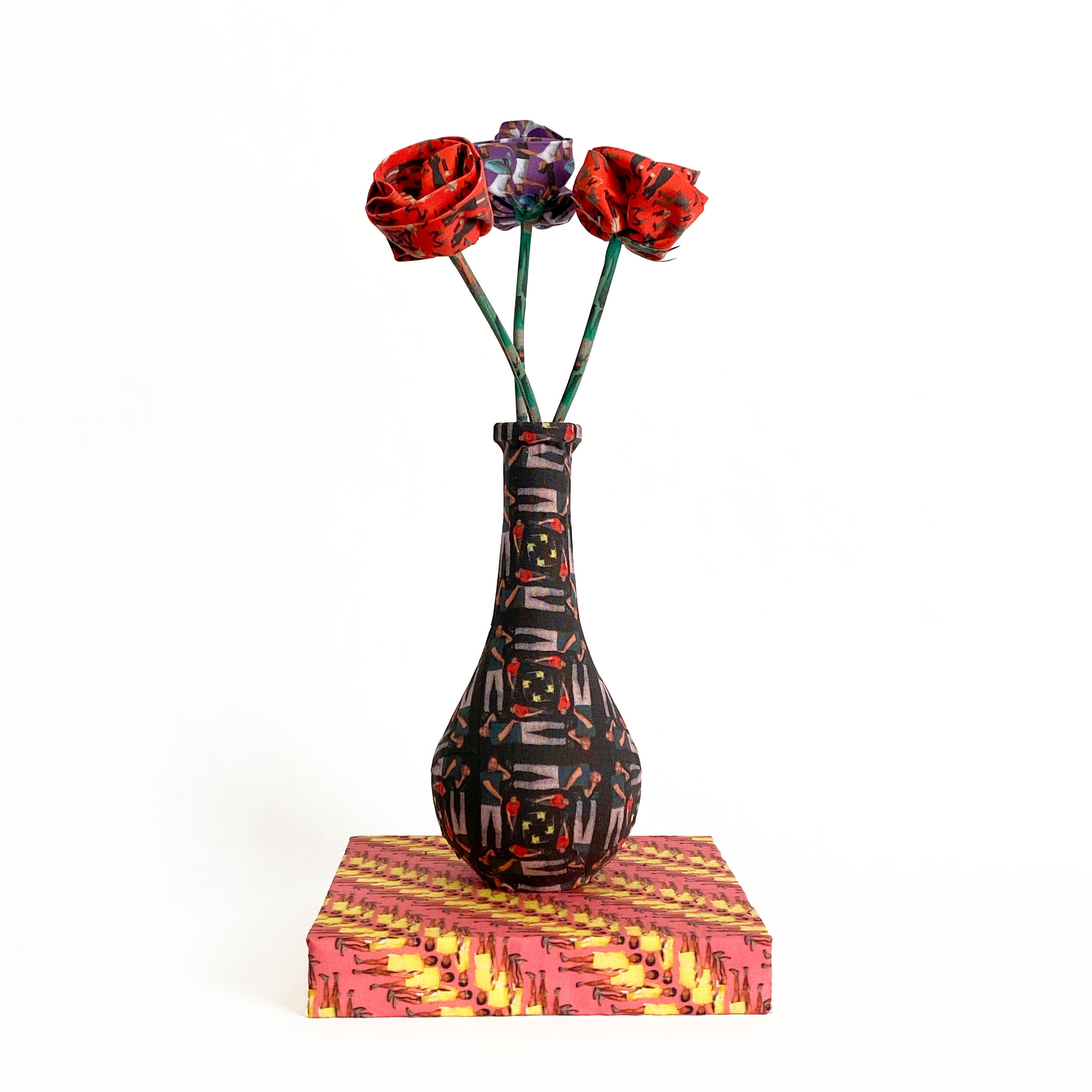 Red-and-Purple-Flowers-in-a-Black-Vase-1.jpg