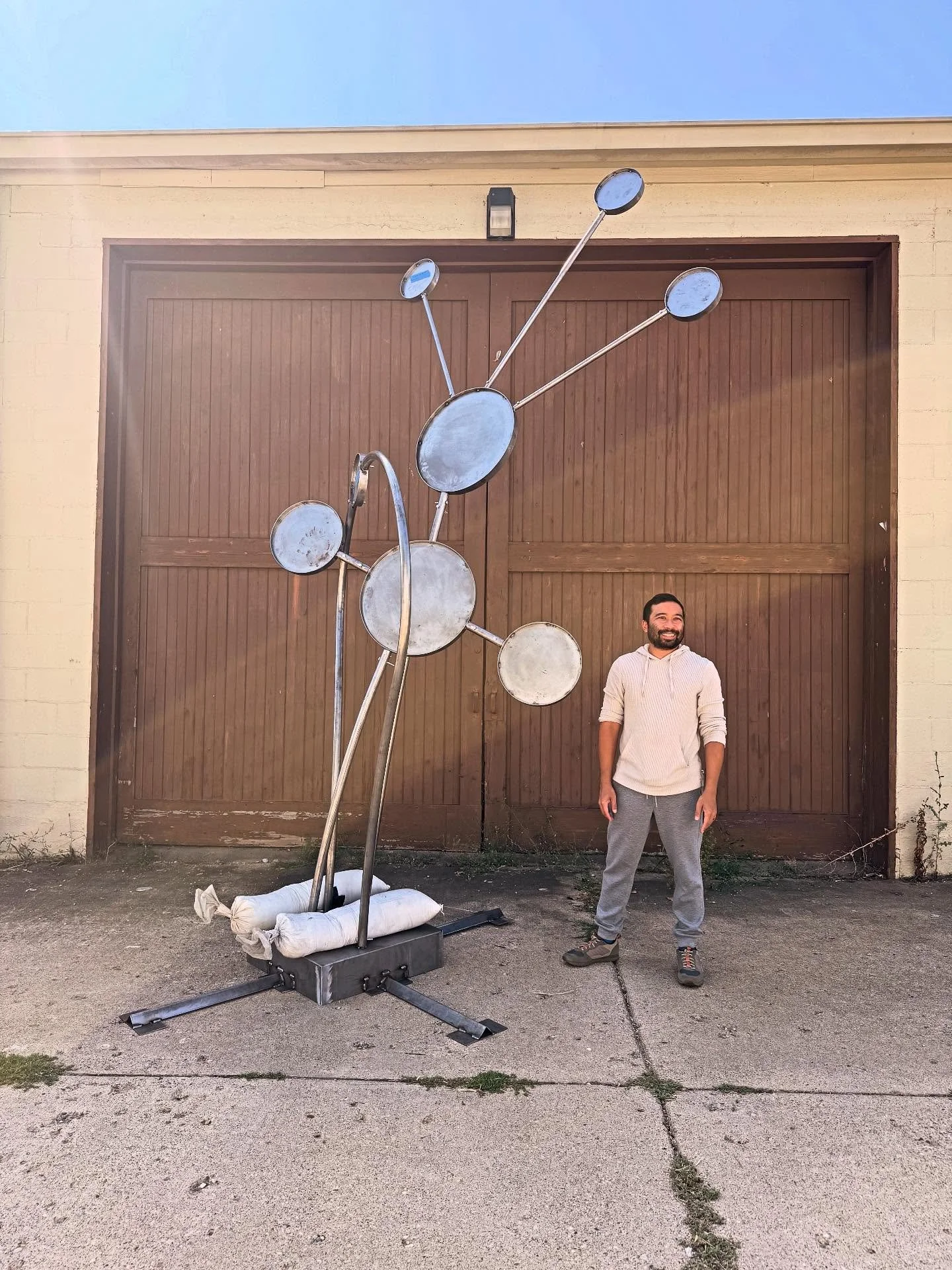 Work in progress with @eacraftworks in Grand Rapids 👷&zwj;♂️ I completely changed the scale and material of my small acrylic flowers that I made earlier this year. It&rsquo;s all so exciting 🌹🌻