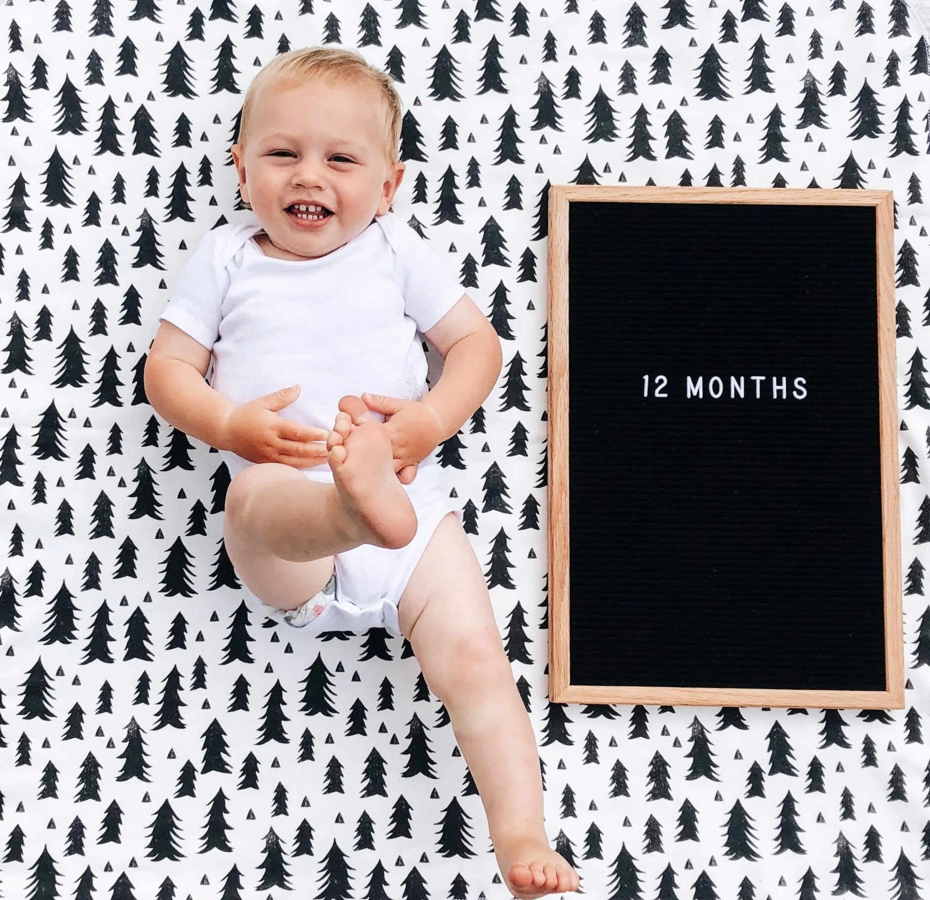 The month of the BIG milestone. My first ever forever baby turned one. He packed in so much before the 30th arrived. By the 5th he was full on walking. He cut two more teeth - number 15 and 16. He started saying and waving “bye” and “hi” any chance he could get. He now signs water, milk, please, and will sometimes point one finger when you ask him how old he is! He really enjoys playing with his lovies - especially Murphy and Rodeo. He’s more quirky and fun than ever. He loves to “sing” which sounds like “bab bab bab” with his arms waving side to side like he’s in an opera house! Everyone notices right away how theatrical he is and how much personality and spunk he has! He’s quite the aggressive player which is mostly fun but probably needs to be harnessed for good haha. If you’re lying on the ground he WILL launch himself over and onto you! Cracking up as he goes! He gives hugs and big open mouthed kisses! And loves book time with "da-da"! He can blow bubbles in the bath and isn’t afraid of putting his head under water. He still has an aversion to cold water. Guess we introduced him to hot springs at too early of an age. He loves Gussie so much and I think he has picked up some dog like behavior from him – like, carrying toys in his mouth and trying to sneak his dog food haha Although, Gus is still getting used to having this little rascally boy around! And this month marked Gideon becoming a BIG BROTHER! So I guess another big milestone this month!