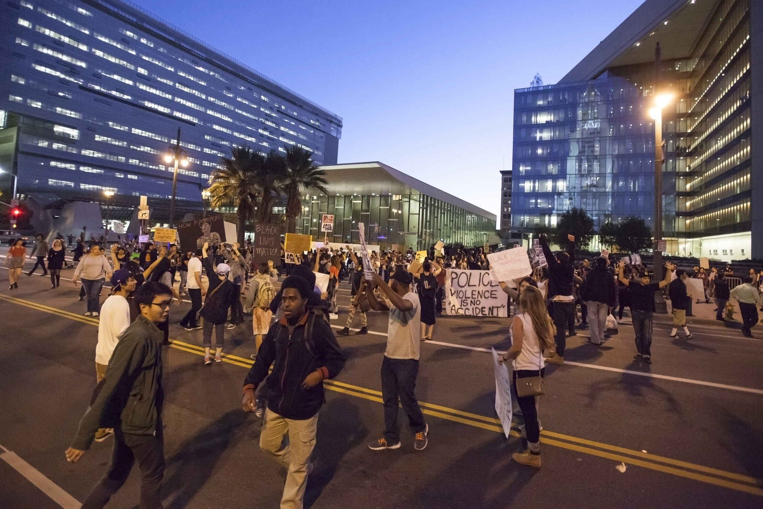  Protesters march in front of LAPD headquarters during a rally in support for Mike Brown on Wednesday Nov. 26, 2014. Mike Brown was shot in Ferguson, Miss. by officer Darren Wilson after a confrontation between the two. Brown's death and officer Wils