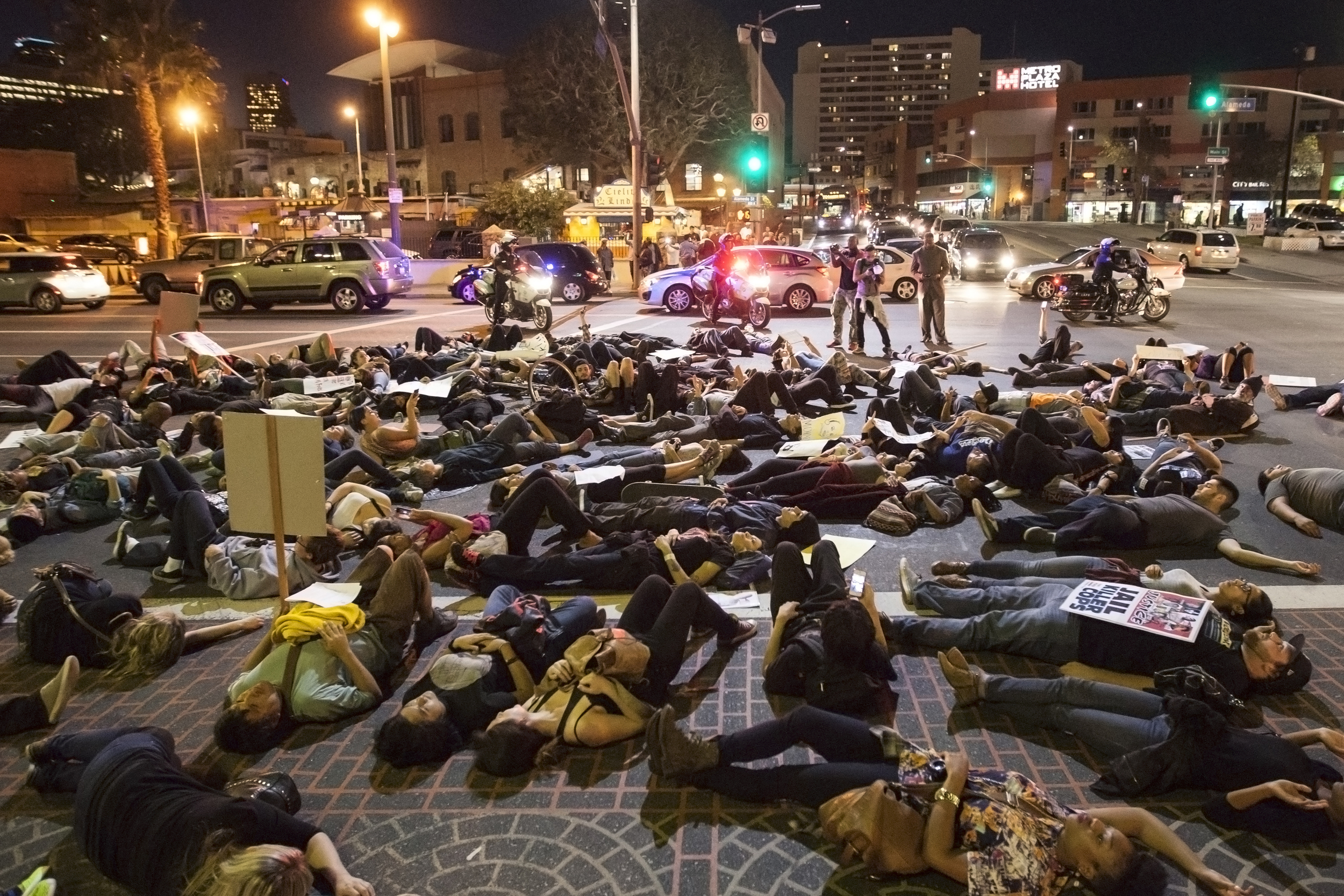  After a grand jury handed down a verdict not indict officer Darren Wilson for the shooting death of Mike Brown, protests and rallys were organized throughout the United States by groups in opposition to the decision. Protesters in Los Angeles marche