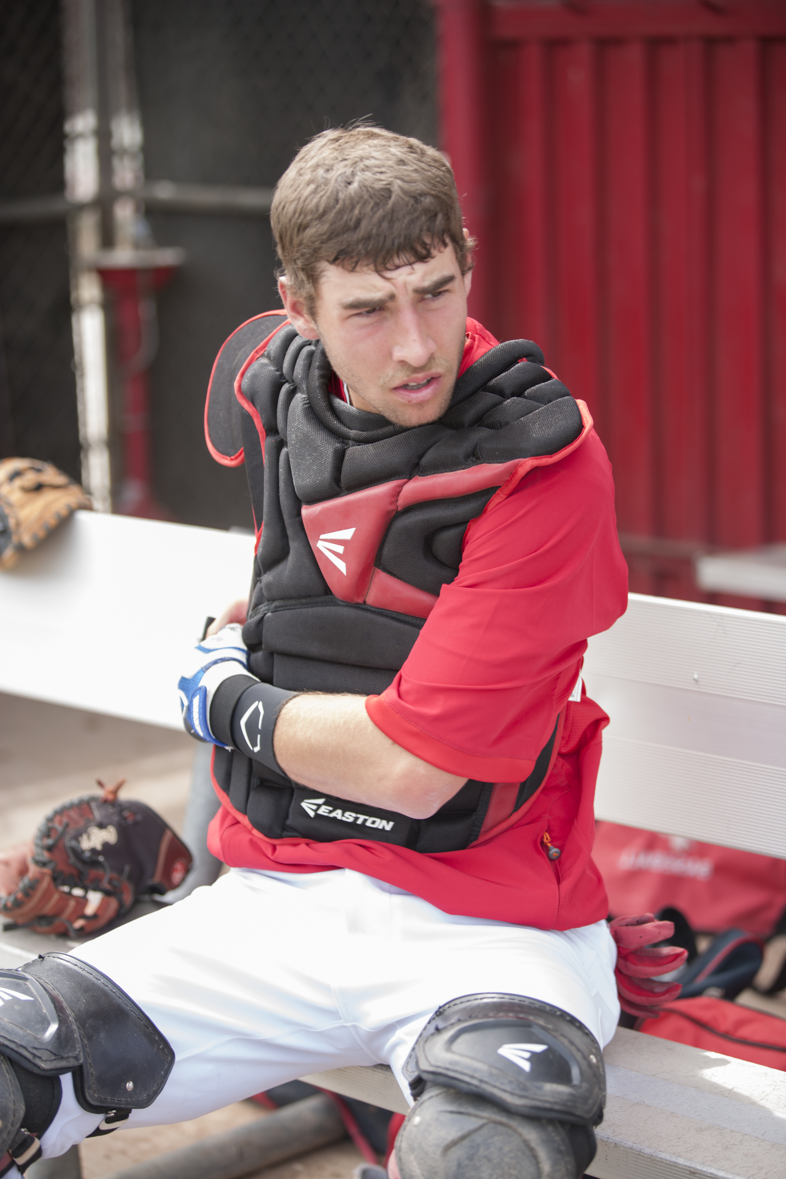  Evan Yeager suits up in a protective catcher's gear in the home team dugout at Joe Kelly Field on Tuesday, March 10, 2015. Woodland Hills, Calif.  Read the full story&nbsp; here  