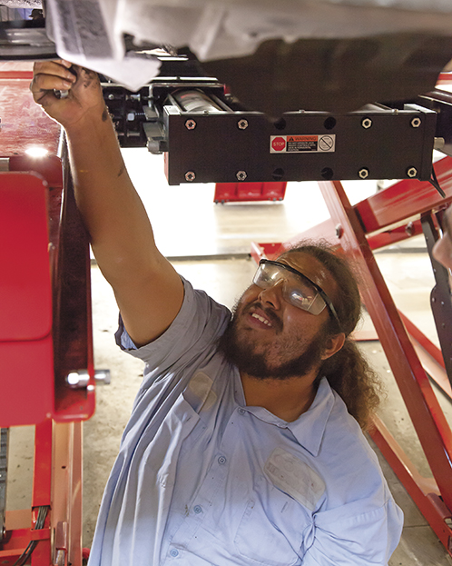  Automotive technology major Lloyd Bryant, 30, adjusts the alignment of a Nissan Altima on an alignment rack machine inside the Automotive Technology building of Pierce College on Monday, May 4, 2015. Woodland Hills, Calif.  Read the full story&nbsp;