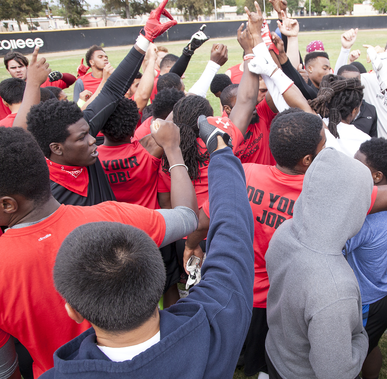  Players on the Pierce College football team gather around in a huddle just before going off to their respective team drills during a spring practice and training session on Thursday, May 14, 2015. Woodland Hills, Calif.&nbsp; 