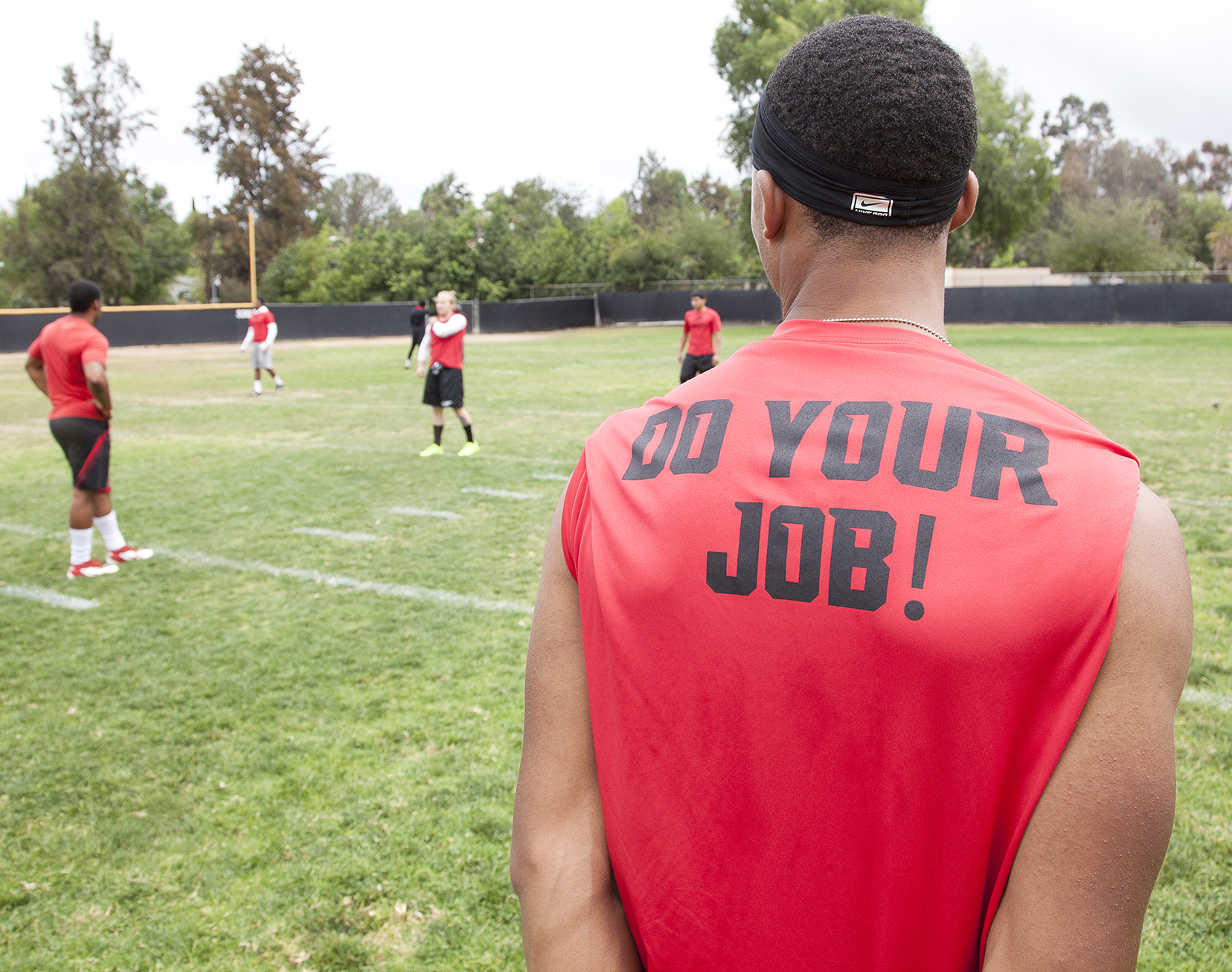  Players on the Pierce College football team wear uniforms that say "Do your job!" during a spring practice and training session on a field adjacent to Joe Kelly baseball field on Thursday, May 14, 2015. Woodland Hills, Calif.&nbsp; 
