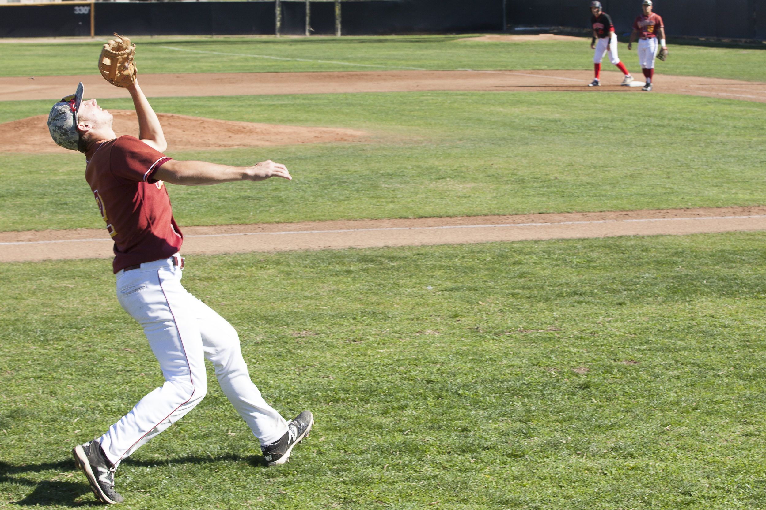  Glendale College 3rd baseman Frank Garriola catches a foul flyball in the second inning during a game against Pierce College in Woodland Hills, Calif. on Saturday, Feb. 13, 2016. 