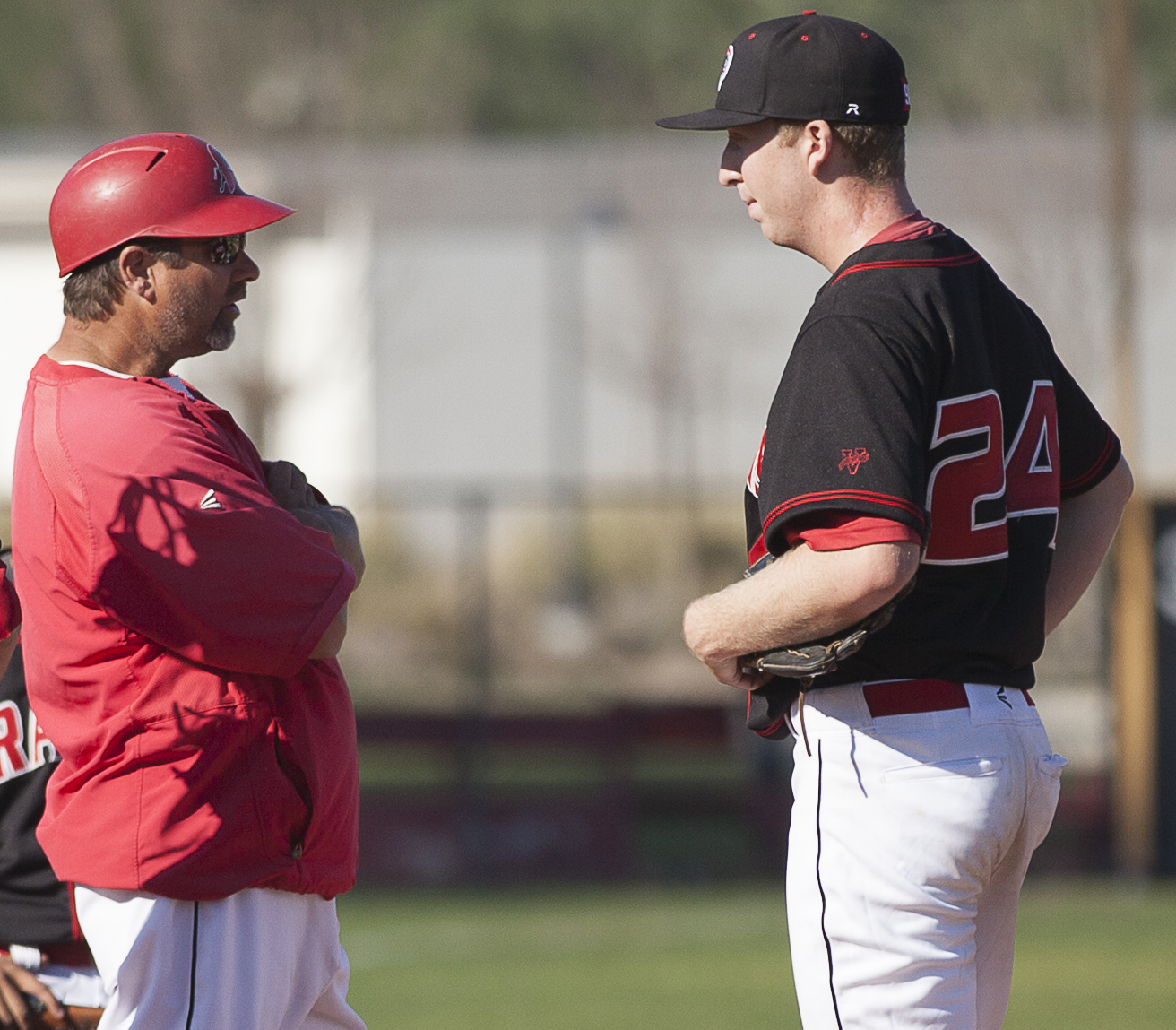  Bill Picketts has a meeting with Brett Weisberg on the mound in the top of the third inning before pulling Weisberg from the game. Weisberg had difficulty against the batters of Glendale College in a home game in Woodland Hills, Calif., on Saturday,