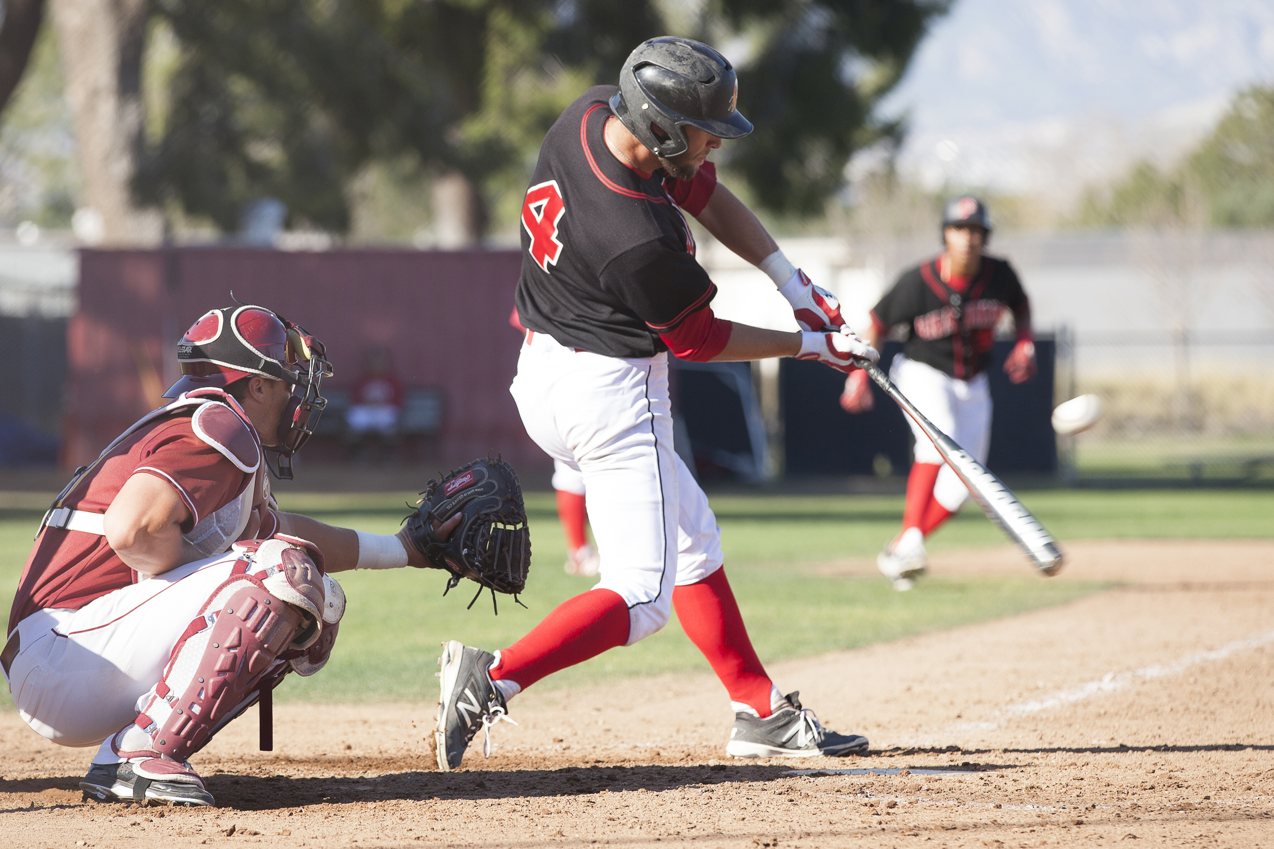  Evan Yeager of Pierce College hits a two-run RBI double to center field with runners in scoring position during a home game in Woodland Hills, Calif. against Glendale College on Saturday, Feb. 13, 2016.&nbsp; 
