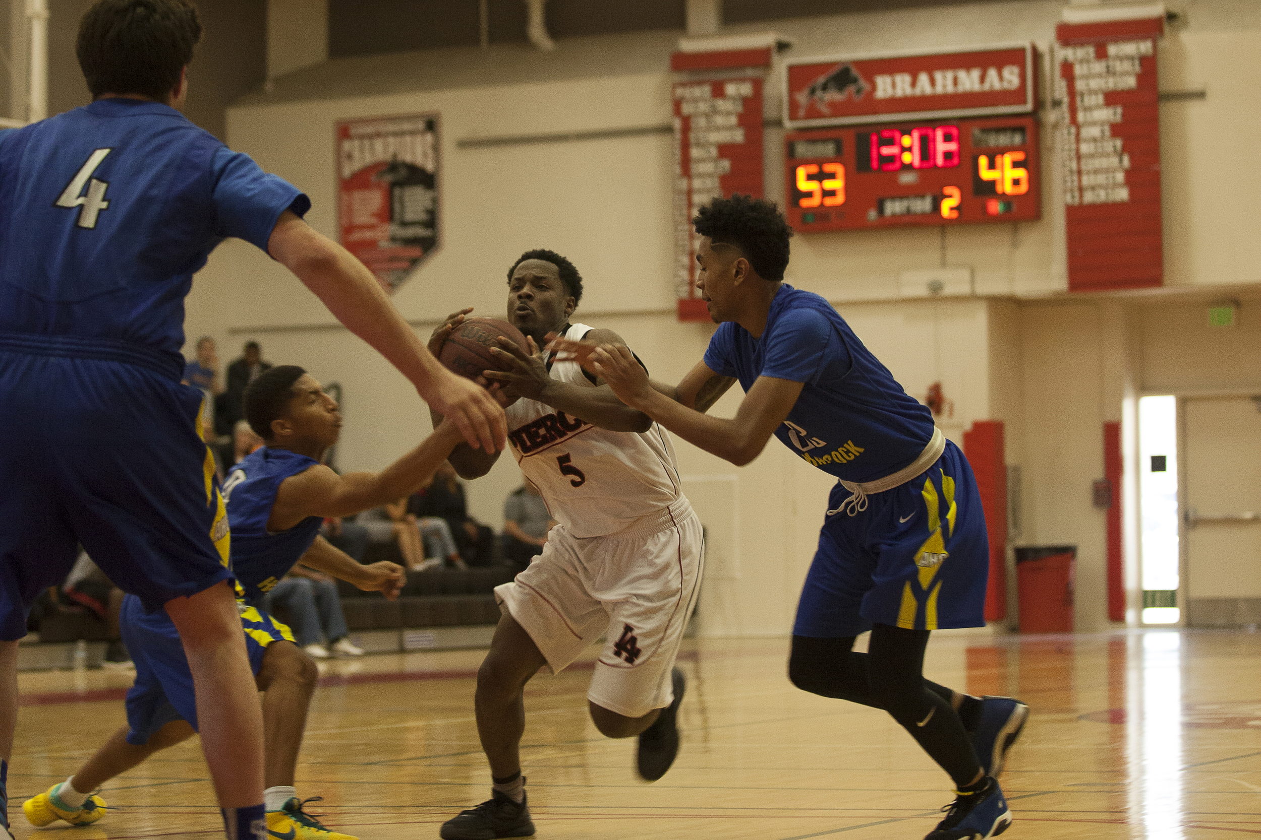  Montel Shirley drives between Allan Hancock defenders in the second half during a home game on Saturday, Feb. 13, 2016 in Woodland Hills, Calif. Pierce would go on to win the game in overtime with a score of 95-91.&nbsp; 