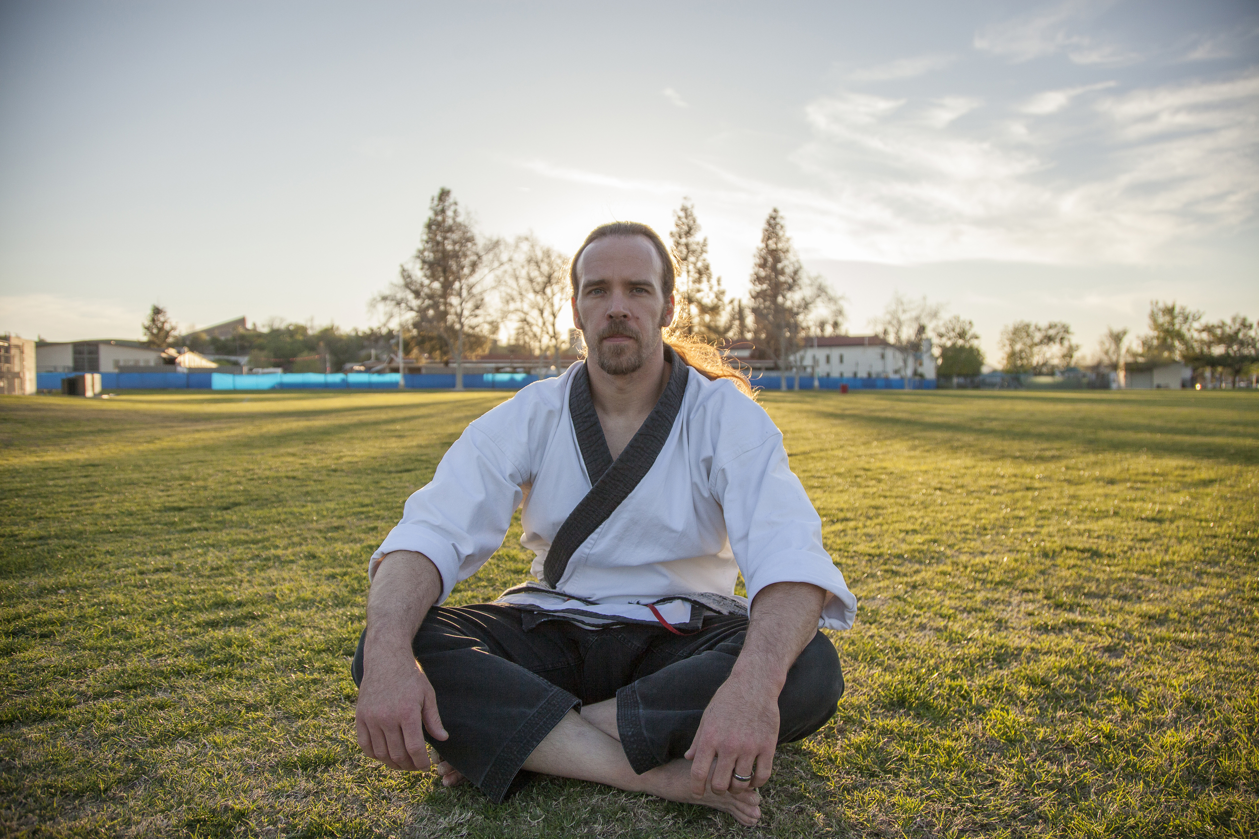  Nathan Carlen, an instructor of martial arts and a professor of kinesiology, sits in a lotus position on the campus of Pierce College in Woodland Hills, Calif. on Thursday, Feb. 25, 2016.  Read more of Carlen's story   here  . 
