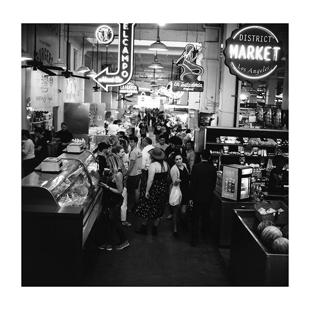 Sometimes I wonder if the world's so small. Grand Central Market scenes. // #filmisnotdead#mediumformat#120#6x6#blackandwhite#foma#fomapan100#legacyshooters#shotbythe17thletter#grandcentralmarket#dtla#streetphotography \\