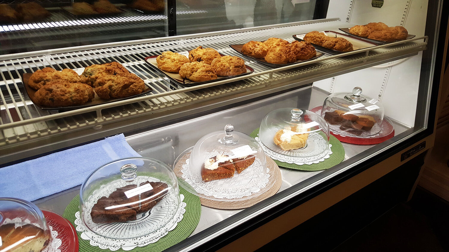  Scones and desserts in the display case. 