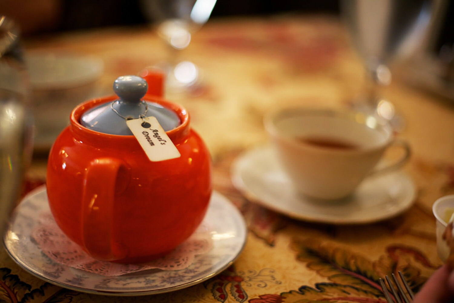  Angel's Dream black tea served in a colorful teapot. 