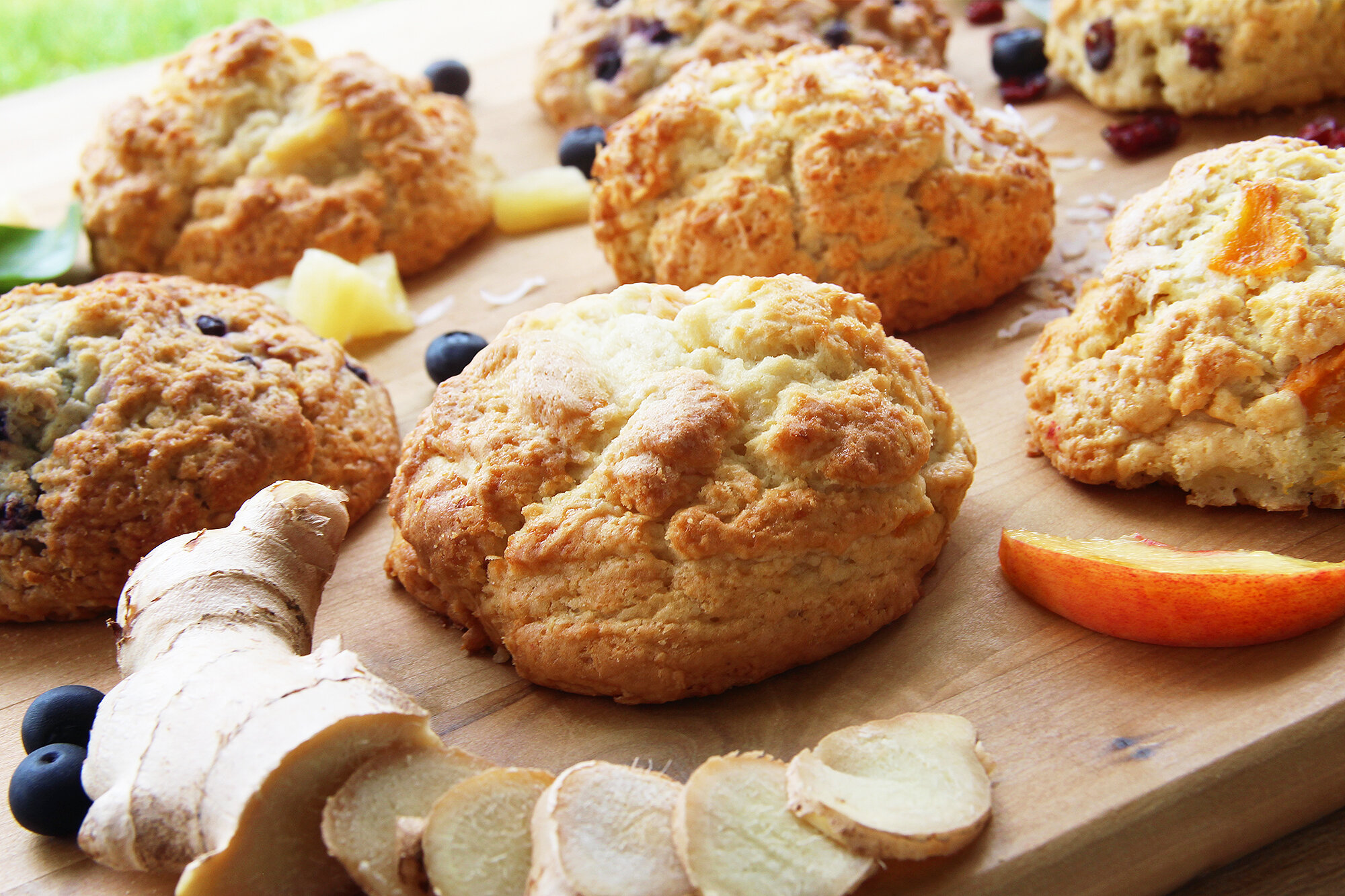 group-of-scones-with-ginger-peaches-blueberries-and-pineapples.jpg
