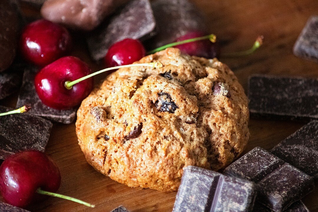 Chocolate Cherry Scones for July's Scone and Tea Subscription Box! 🍒 🤩

Made with chocolate dough, dried cherries, and dark and semi sweet chocolate chips these scones are to die for! 🥰

Paired with White Swiss Truffle Rooibos they make a wonderfu