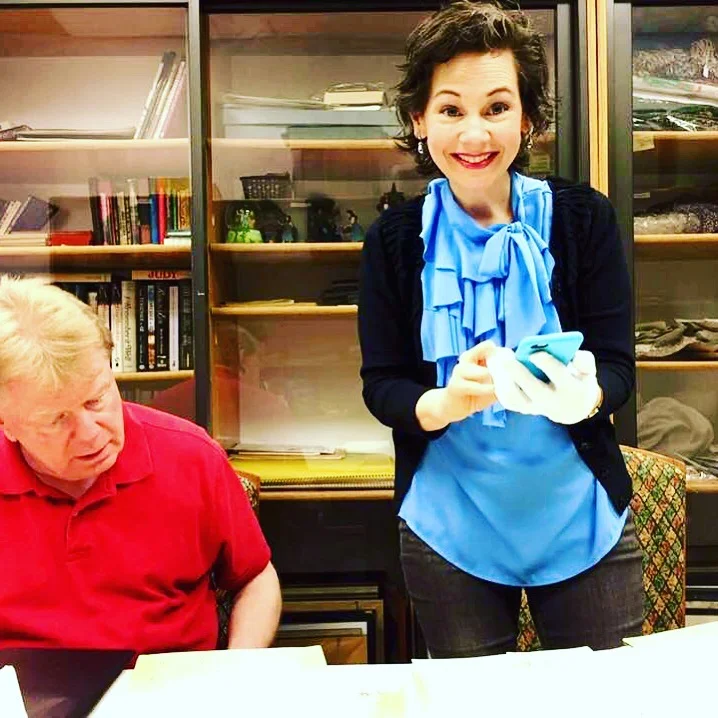 Studying orchestral arrangements with John Fricke and Michelle Russell (taking the photograph).