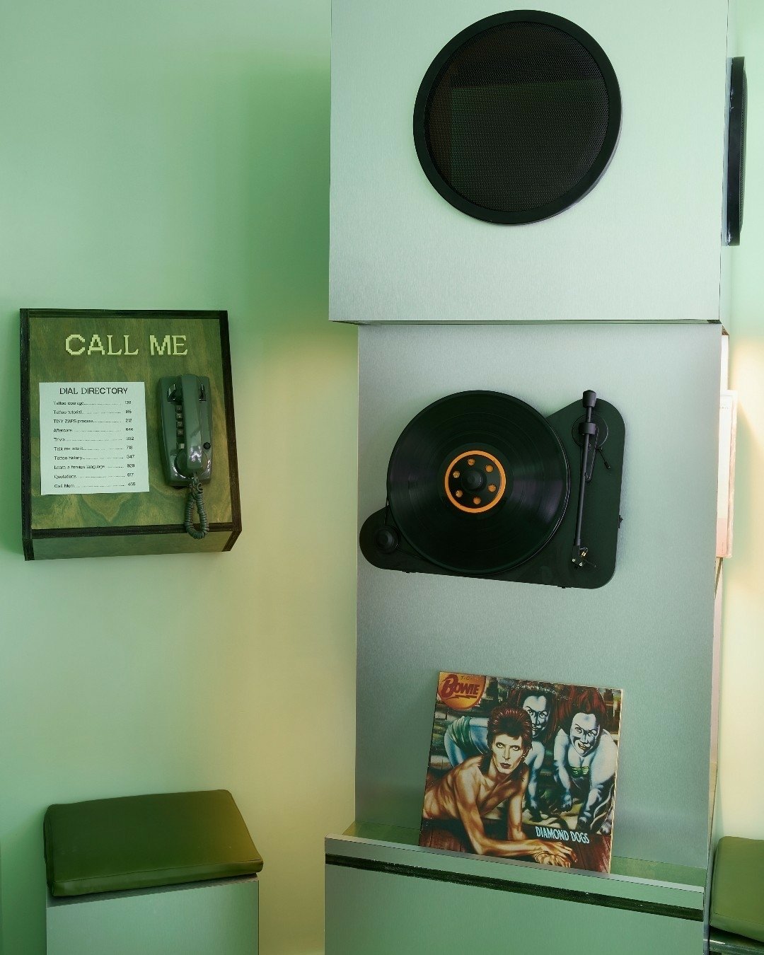 Explore Tiny Zaps' world by curating your own sonic environment, an intentional blend of tactile design, warm analog sound, and personal ritual. Or pick up the retro phone to dial into stories about tattoo history, tattoo aftercare or just some tatto