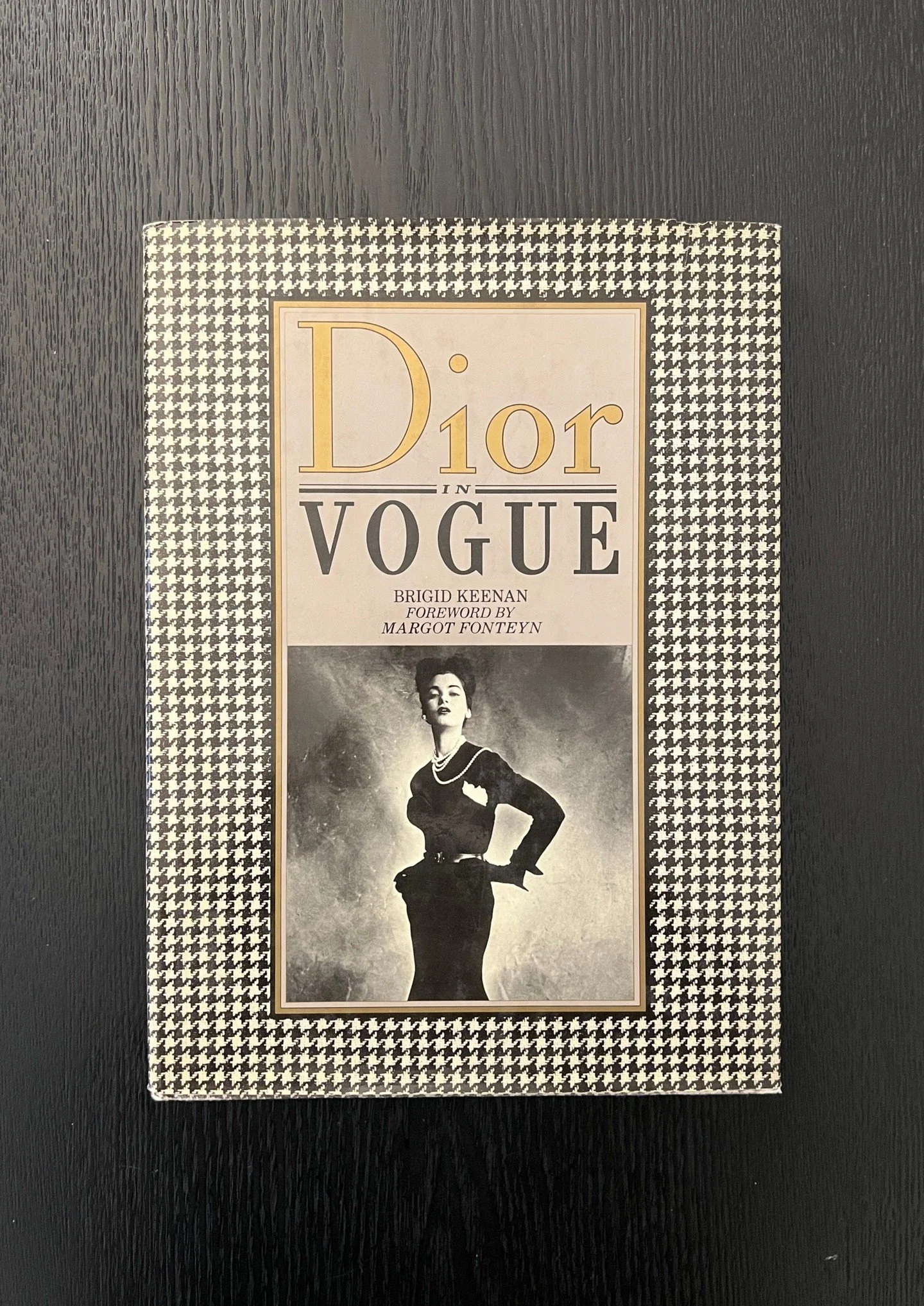 Dior in Vogue by Brigid Keenan is a 1981 book- a timeless look at Christian Dior's rise to fame, focusing on his revolutionary "New Look" collection of 1947 and his subsequent career, exploring his dual personality as a private man and publ