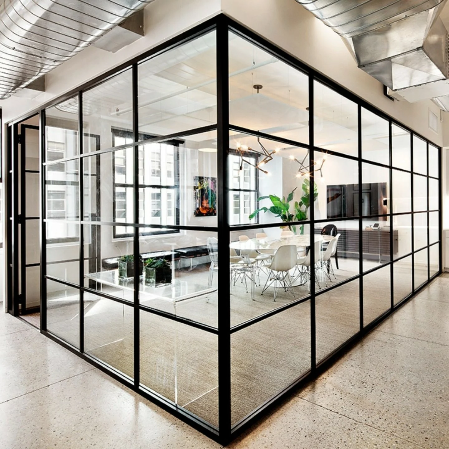 One of our favorite workplace projects to date.
Designed for Nike Communications, this meeting space uses a monochromatic palette to amplify natural light, creating a bright and inviting environment. Layered neutral tones are balanced with bold black