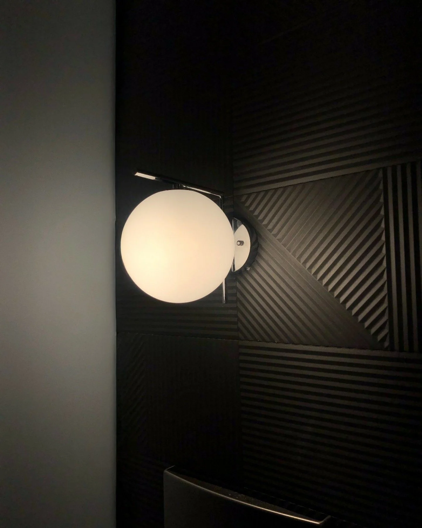 For MediaRadar&rsquo;s workplace, we treated the bathroom as more than a back-of-house space. A high-contrast, textured tile palette paired with moody lighting transforms the restroom into a moment of pause and reset. Designed with the same care as t