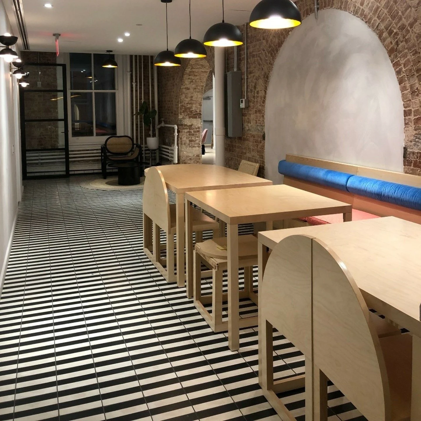 At the center of Bandier&rsquo;s headquarters is a custom communal space designed as the social and creative core of the office. Intended for meetings, gathering, and collaboration, it anchors the overall layout and strengthens connections across the