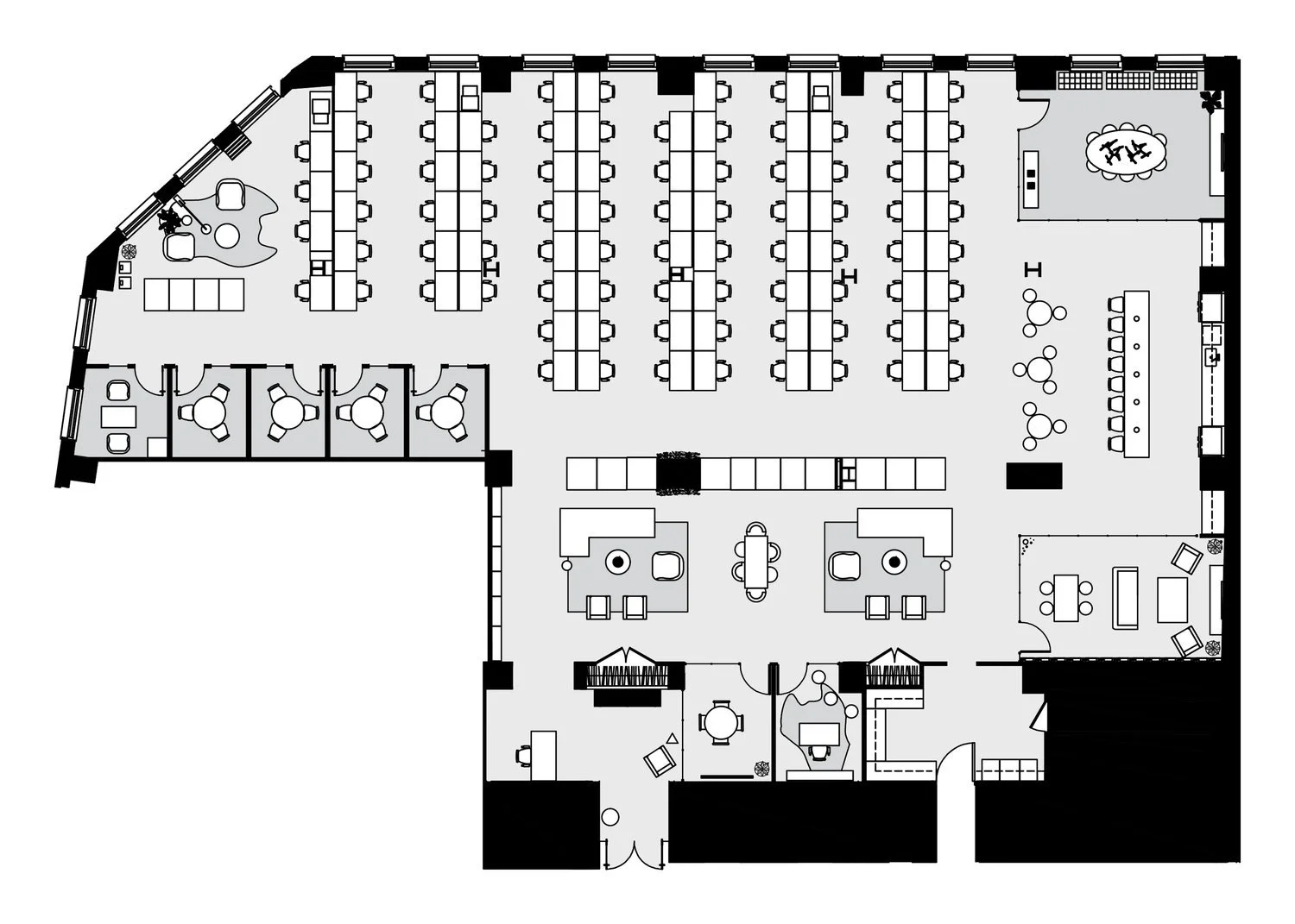 Office floor plan with multiple workstations, private offices, meeting rooms, a lounge area, and restrooms.