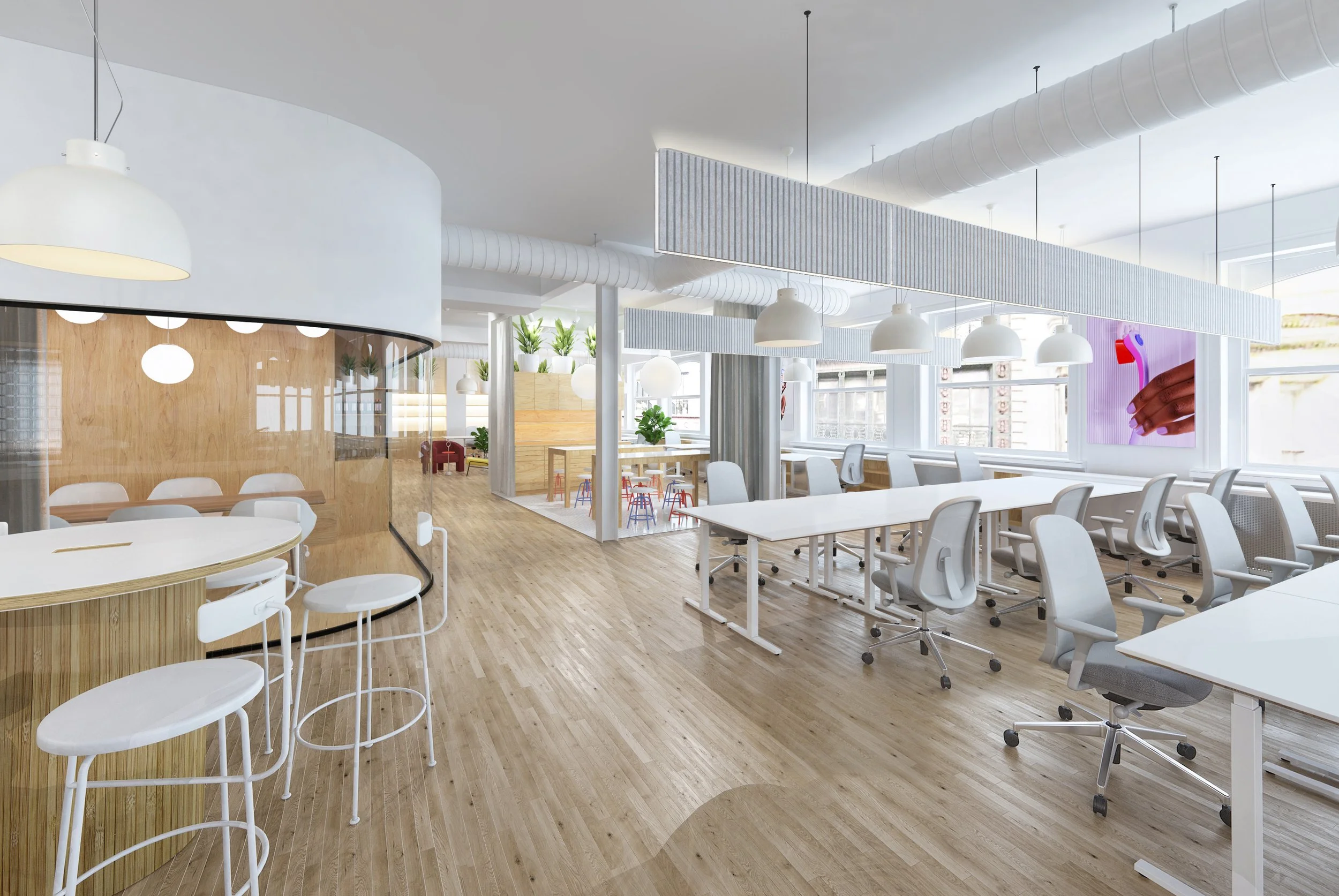 Modern open office space with workstations, chairs, hanging lights, wooden flooring, and a glass-walled meeting room.