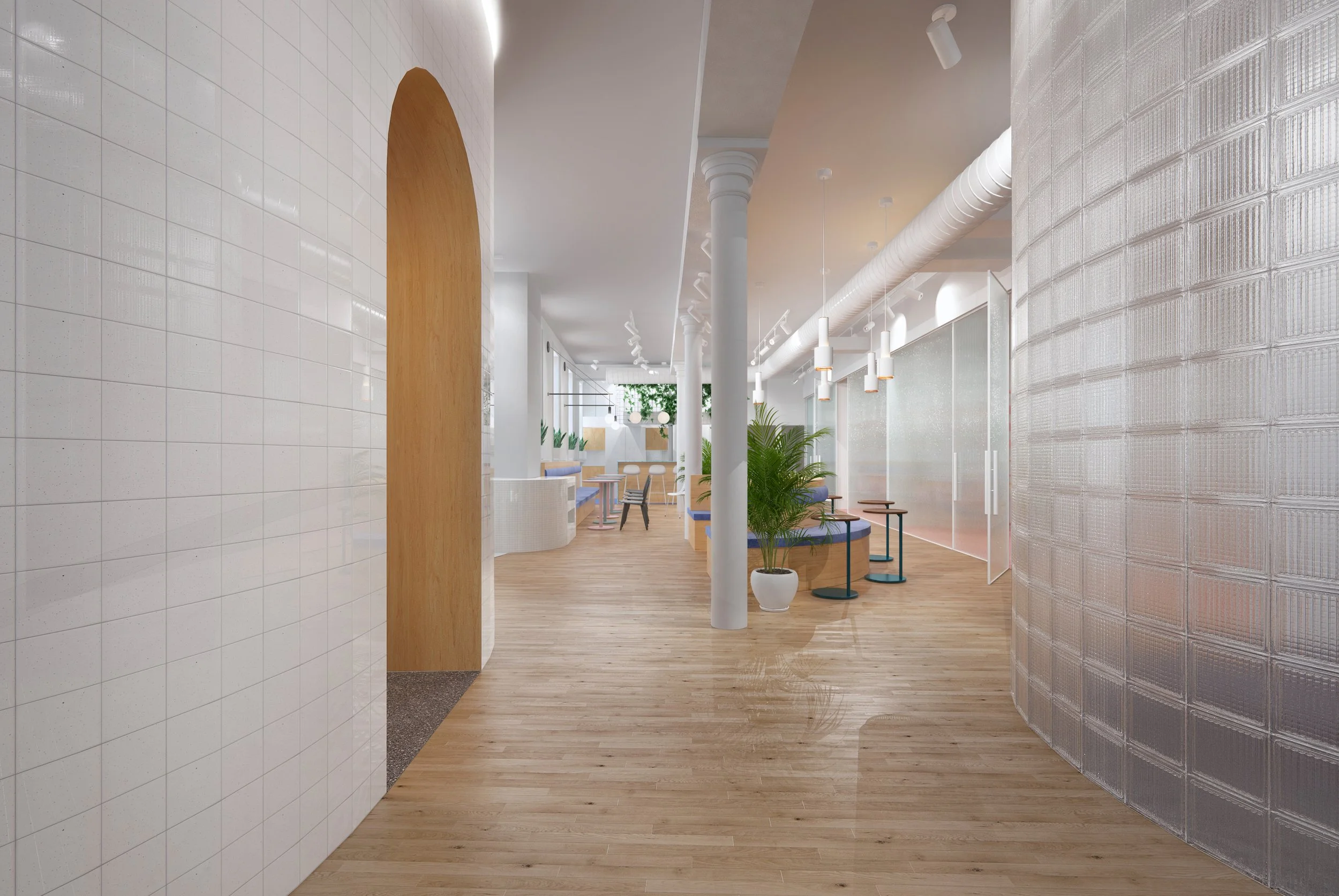 Modern interior design with wooden floors, white tiled walls, glass block partitions, and a mix of seating with plants and pendant lights.